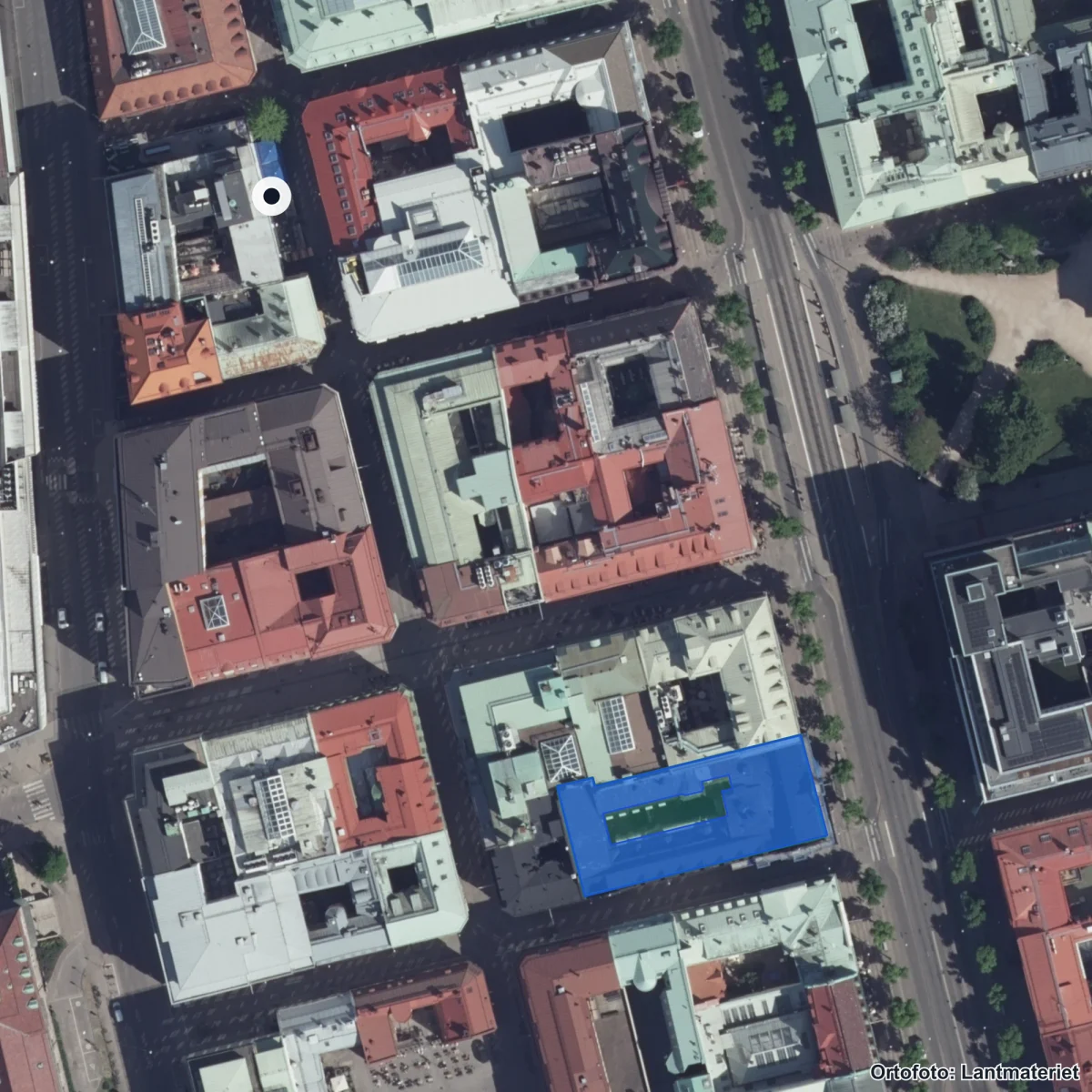 Flygbild över Kitas Gymnasium, ortofoto från Lantmäteriet