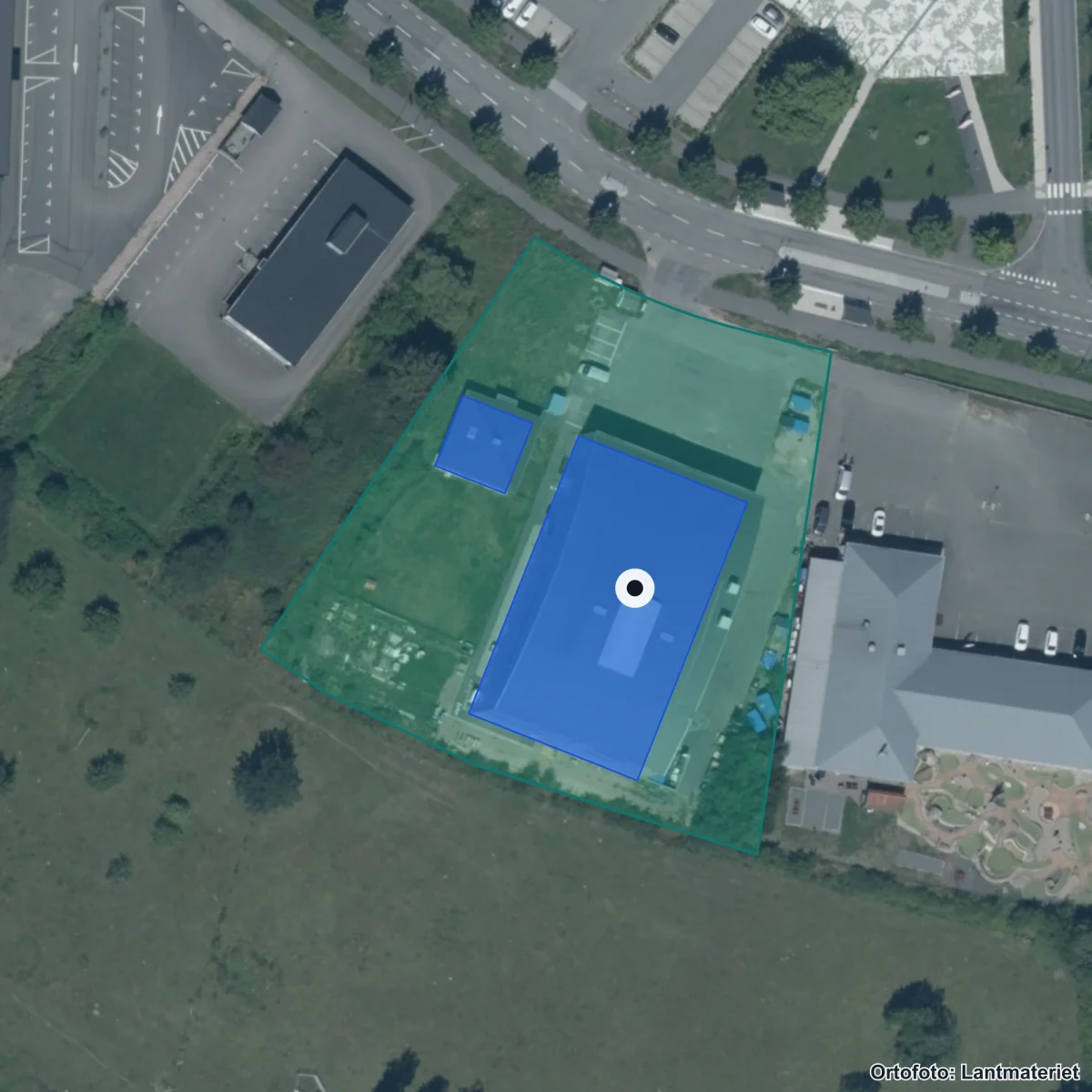 Flygbild över Praktiska Gymnasiet Kristianstad, ortofoto från Lantmäteriet