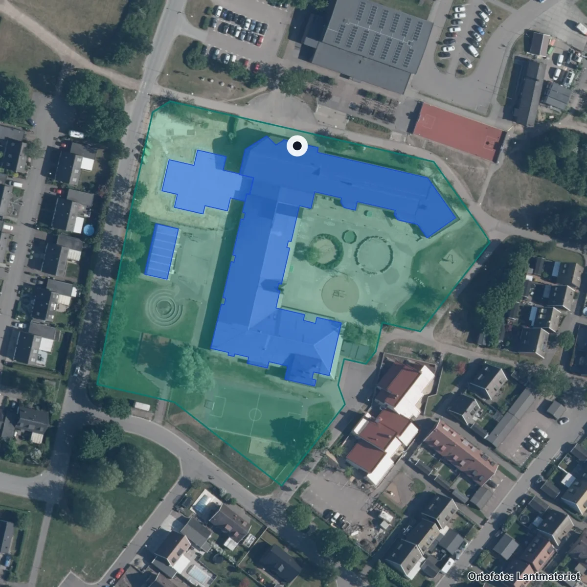 Flygbild över Sandåkerskolan, ortofoto från Lantmäteriet