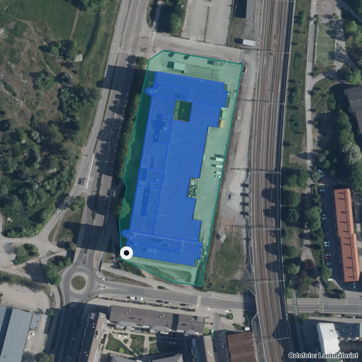 Flygbild över Drottning Blankas Gymnasieskola Jakobsberg, ortofoto från Lantmäteriet