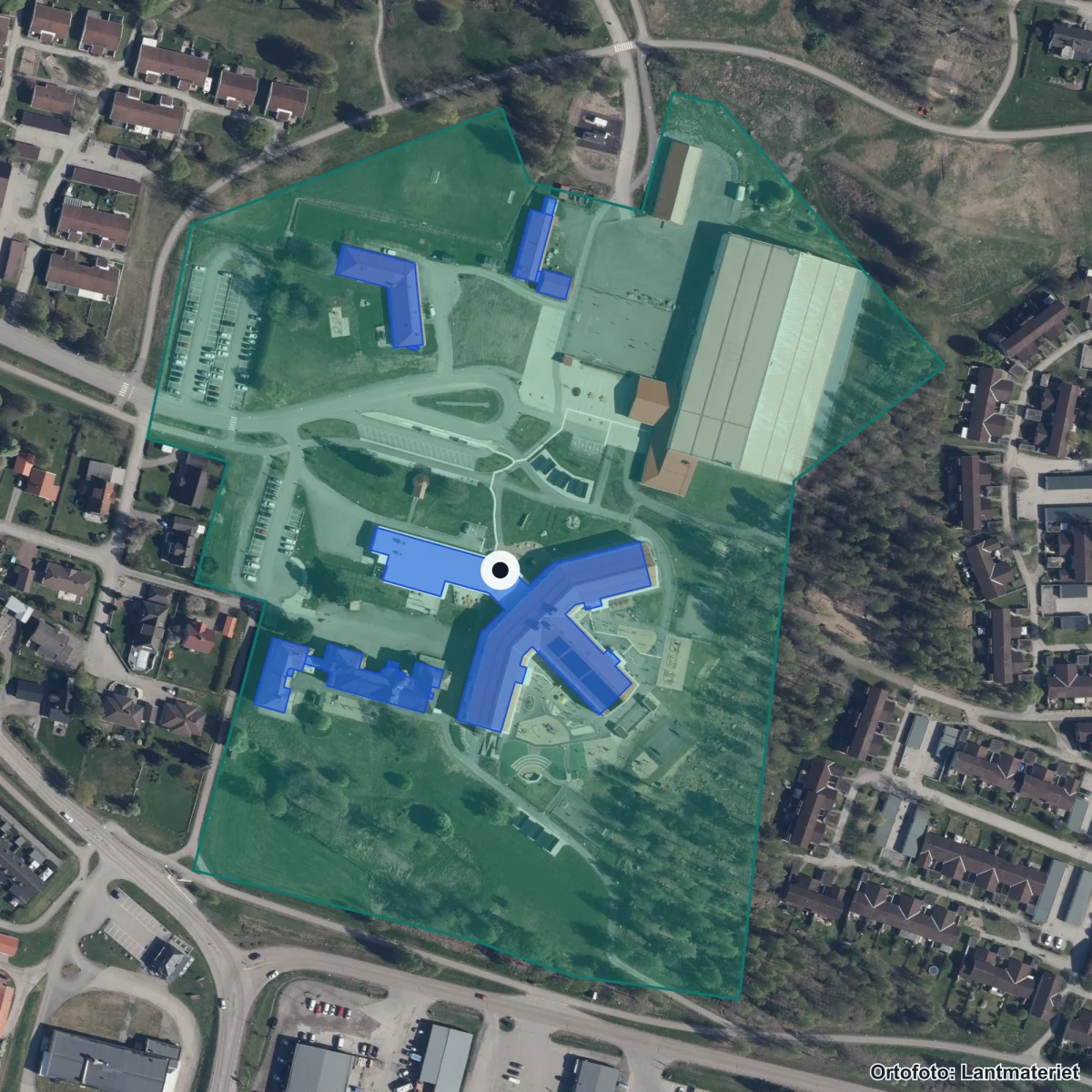 Flygbild över Renshammarskolan, ortofoto från Lantmäteriet