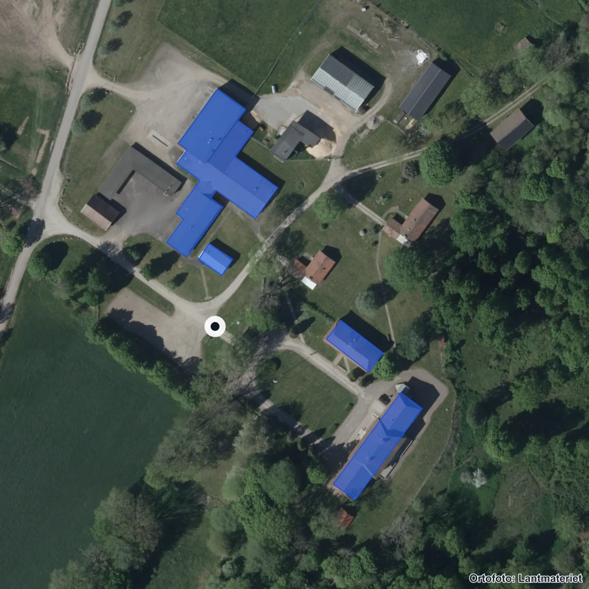 Flygbild över Olinsgymnasiet Sparresäter, ortofoto från Lantmäteriet