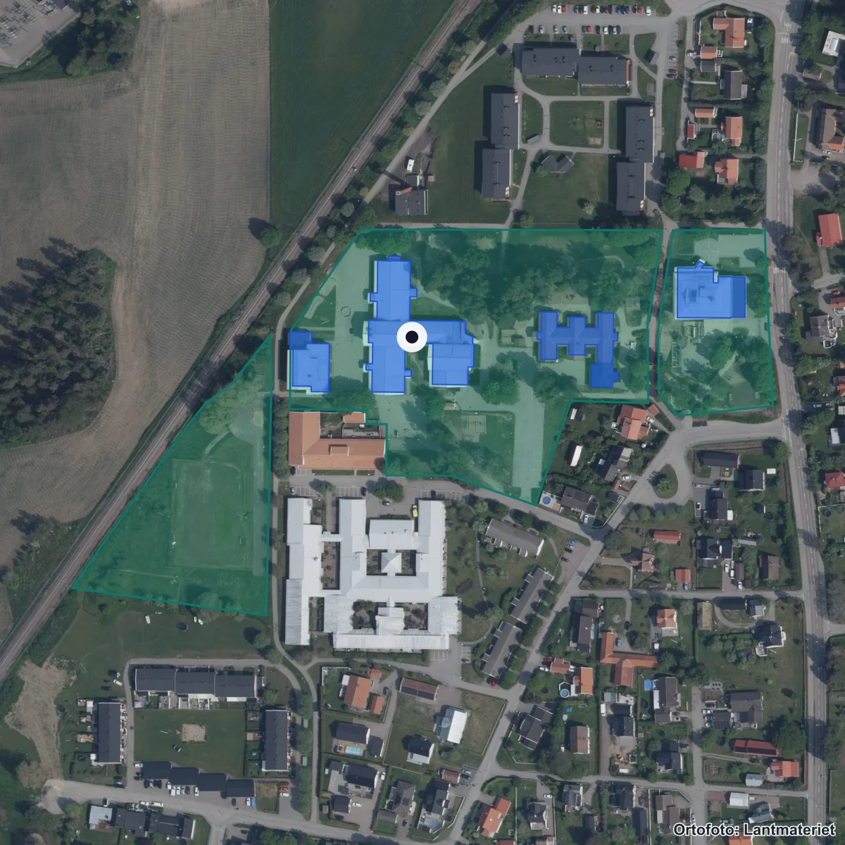 Flygbild över Milboskolan, ortofoto från Lantmäteriet
