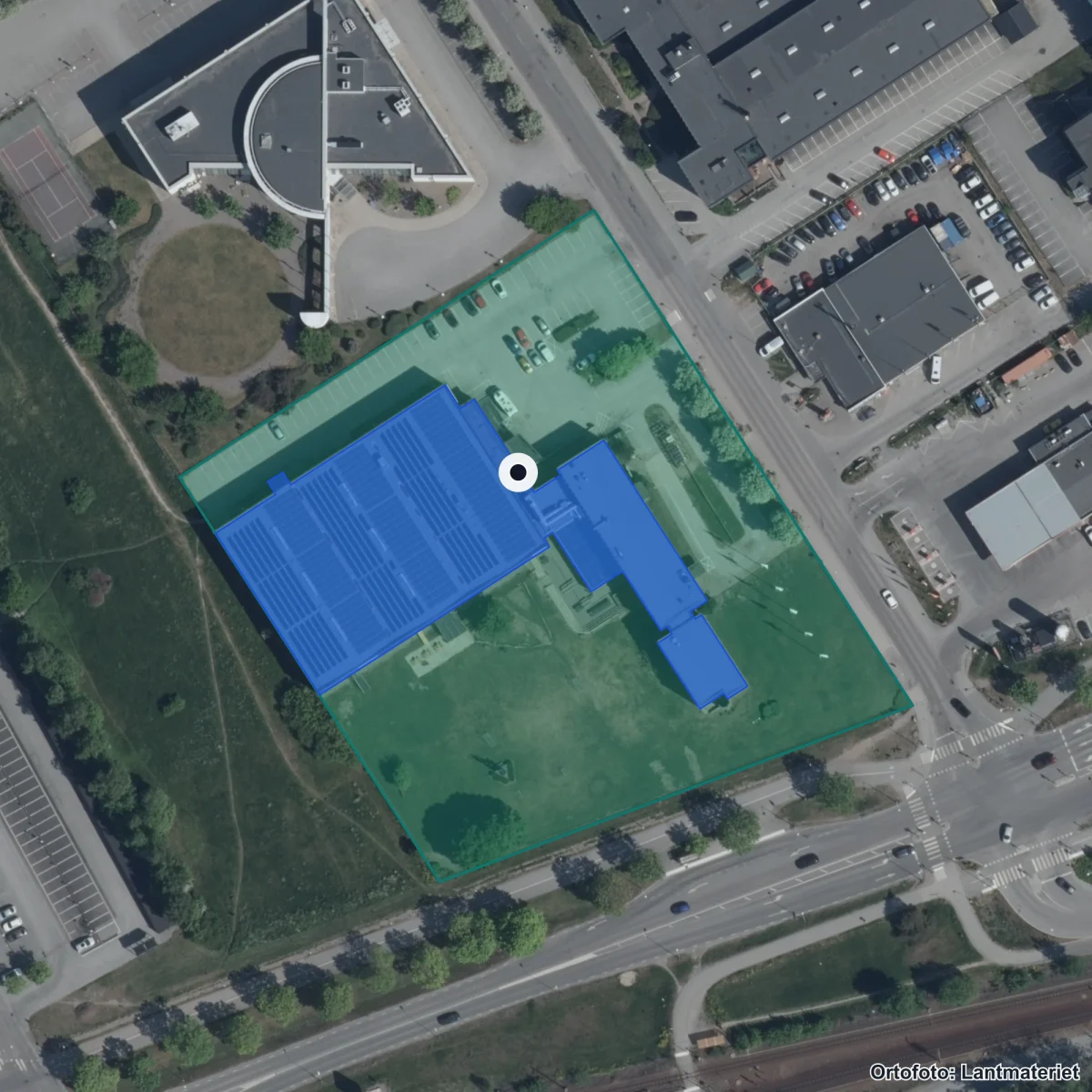 Flygbild över Täby Enskilda Gymnasium, ortofoto från Lantmäteriet