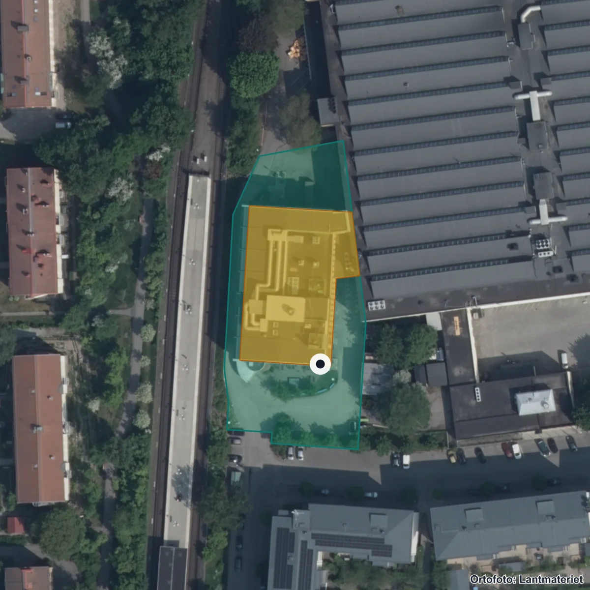 Flygbild över Drottning Blankas Gymnasieskola Stockholm Södra, ortofoto från Lantmäteriet