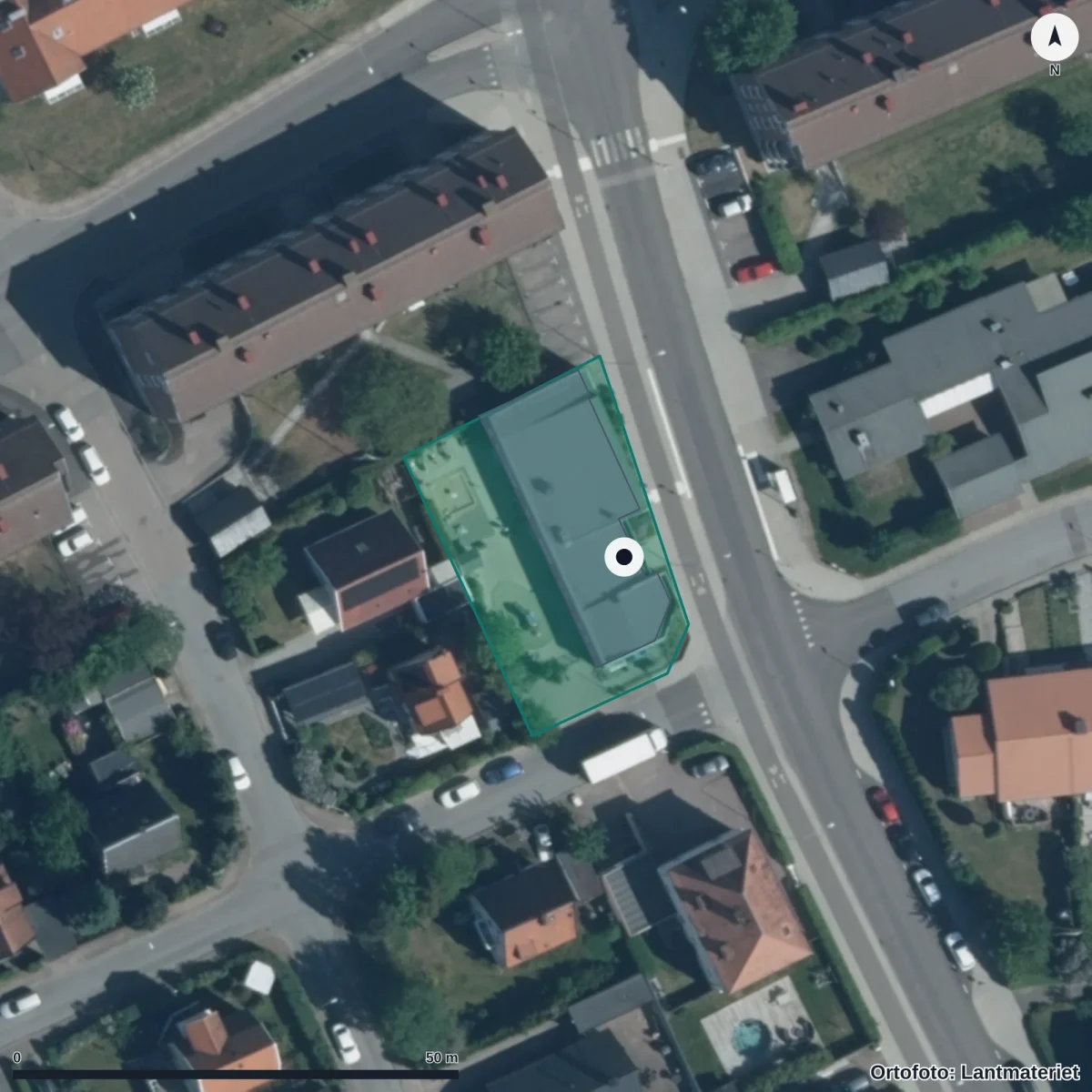 Flygbild över Dibber Fröhusets Montessoriförskola, ortofoto från Lantmäteriet