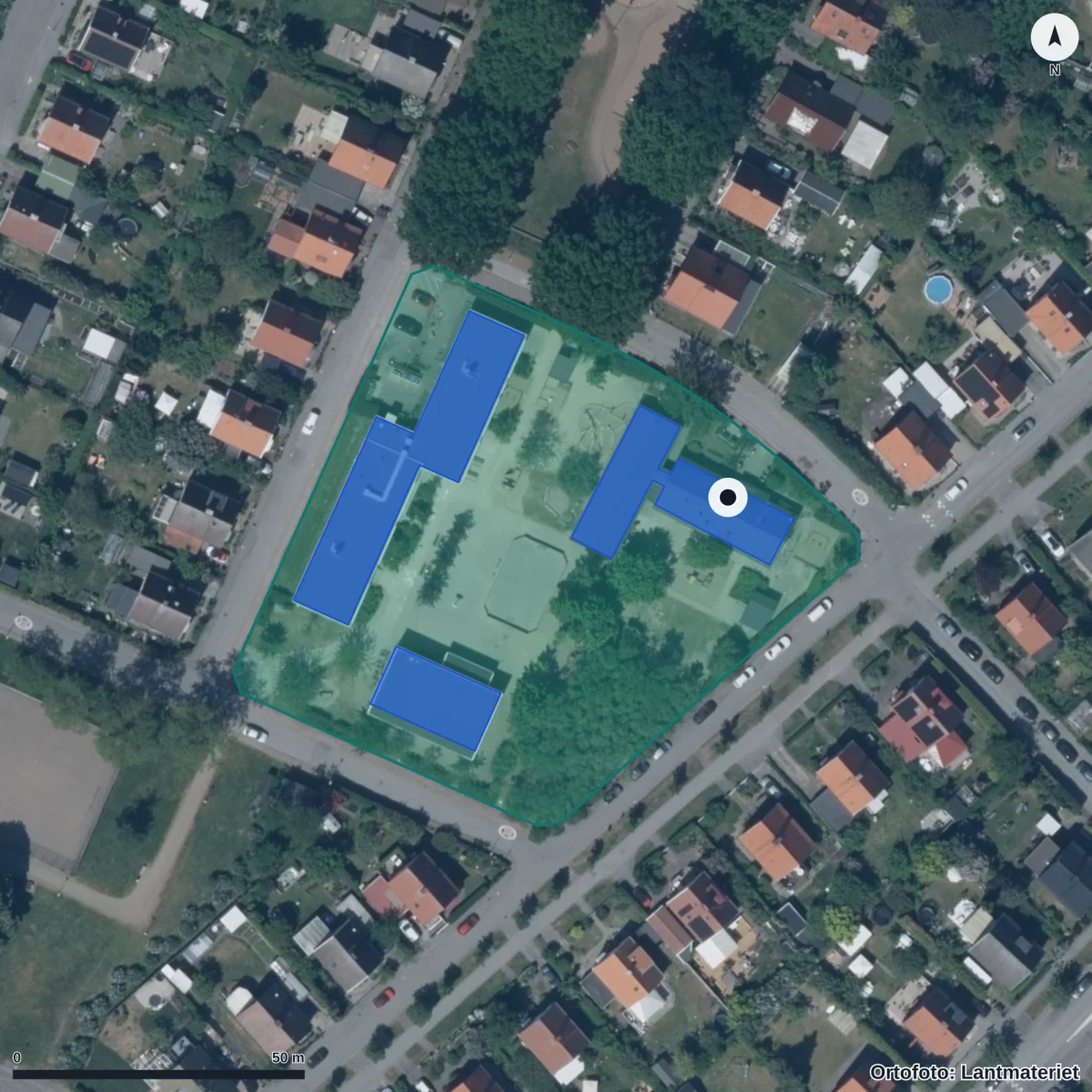 Flygbild över Karlshögs Förskola, ortofoto från Lantmäteriet