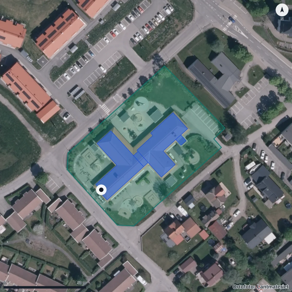 Flygbild över Stommens Förskola, ortofoto från Lantmäteriet