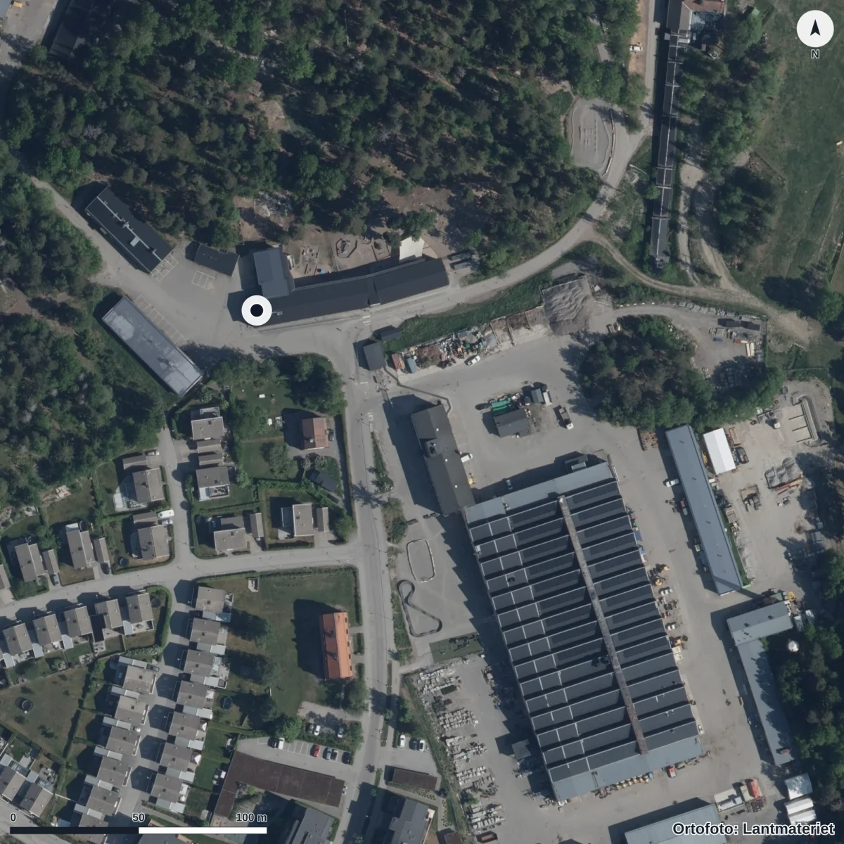 Flygbild över Milot, ortofoto från Lantmäteriet