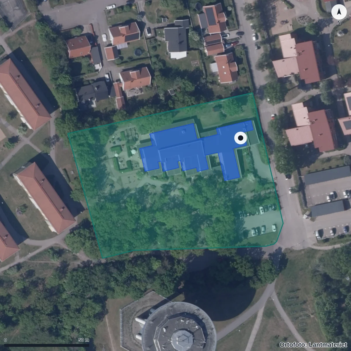 Flygbild över Förskolan Trollet, ortofoto från Lantmäteriet
