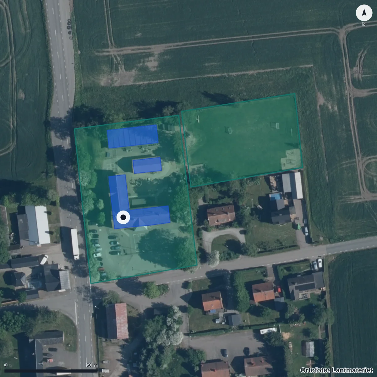 Flygbild över Kingelstad Byskola/förskola, ortofoto från Lantmäteriet