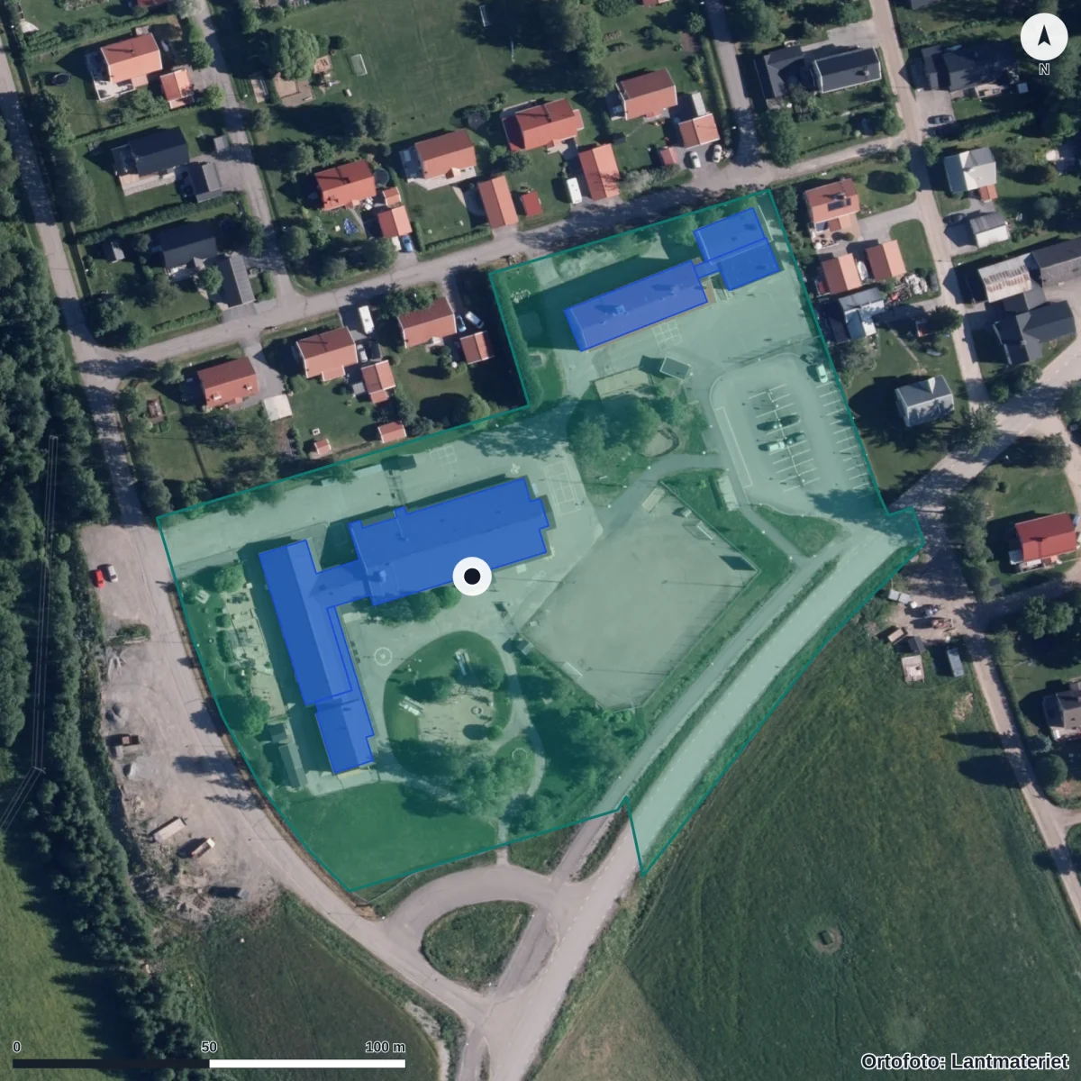 Flygbild över Förskolan Tavelsjö, ortofoto från Lantmäteriet