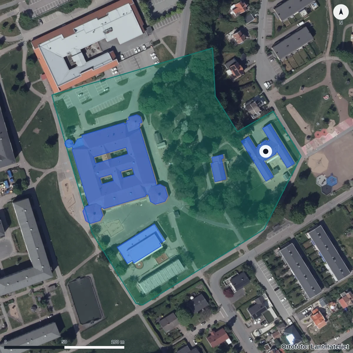 Flygbild över Rödhaken Förskola, ortofoto från Lantmäteriet