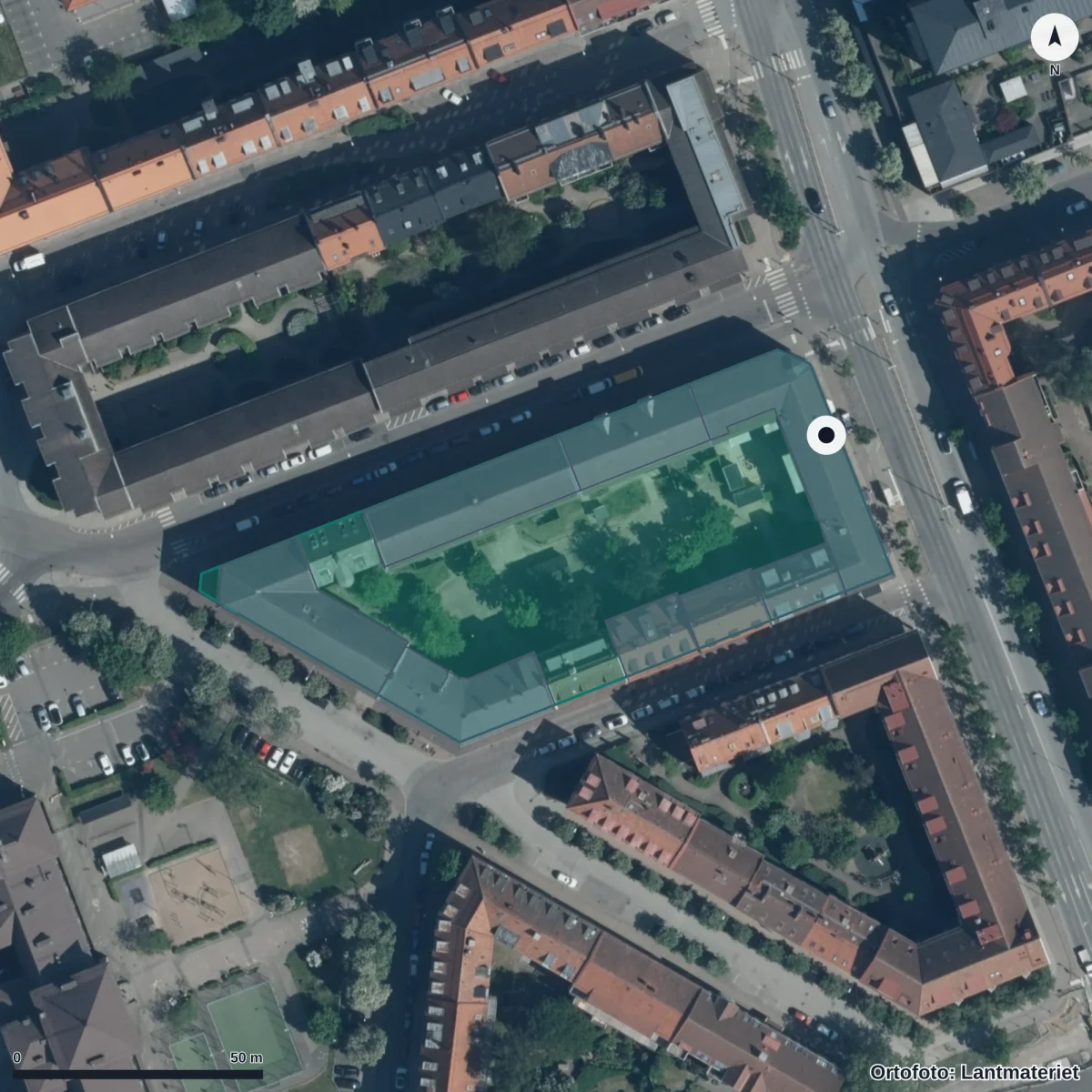 Flygbild över Gräshoppans Förskola, ortofoto från Lantmäteriet