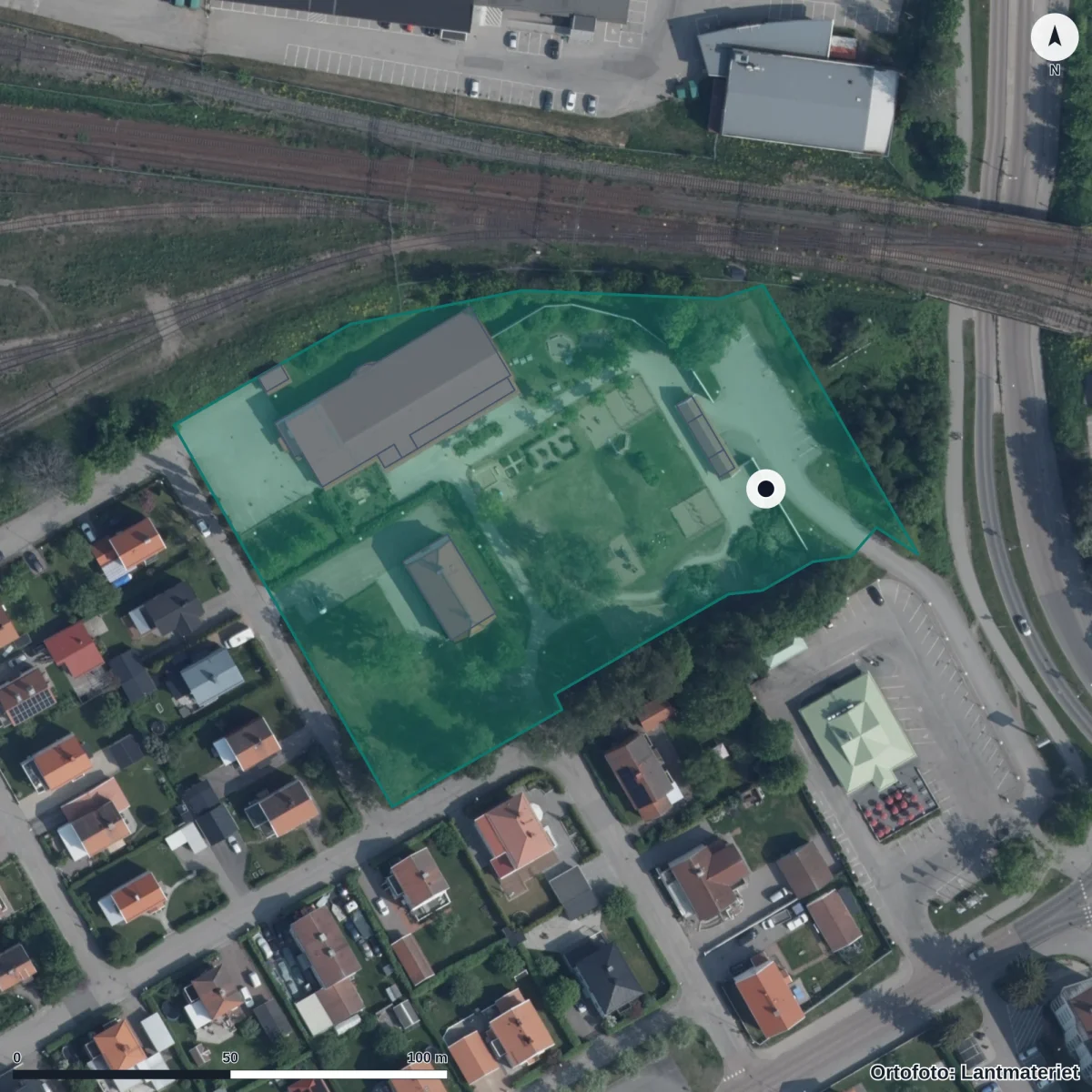 Flygbild över Herrgårdens Förskola, ortofoto från Lantmäteriet