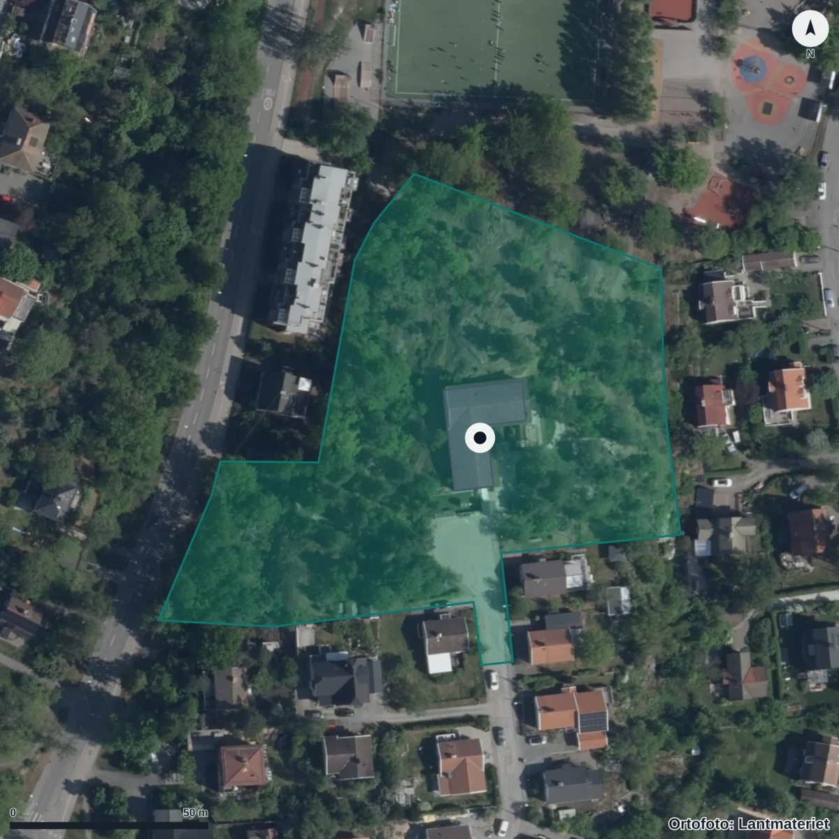 Flygbild över Förskolan Toppen, ortofoto från Lantmäteriet