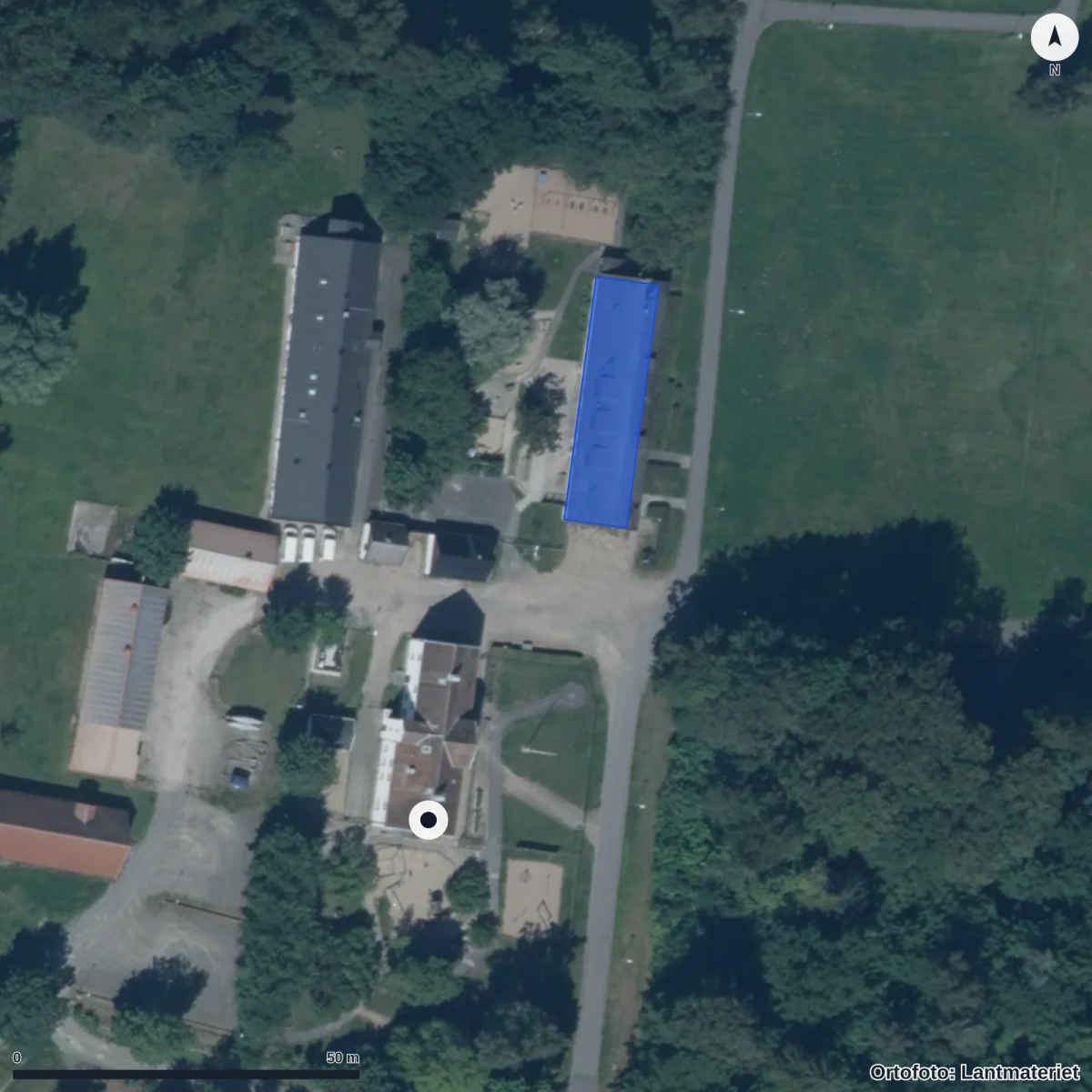 Flygbild över Öllsjögårds Förskola, ortofoto från Lantmäteriet