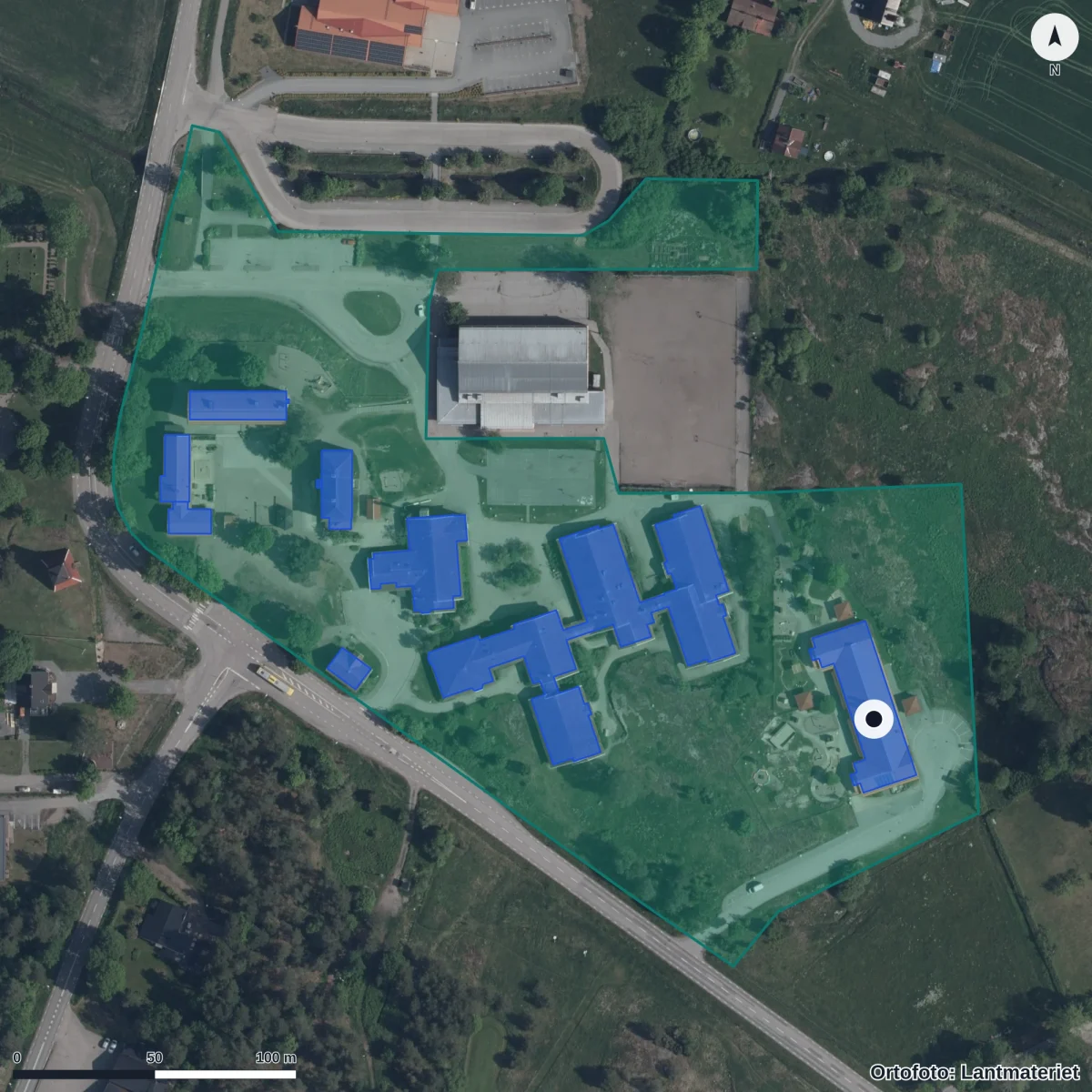 Flygbild över Almunge Förskola, ortofoto från Lantmäteriet