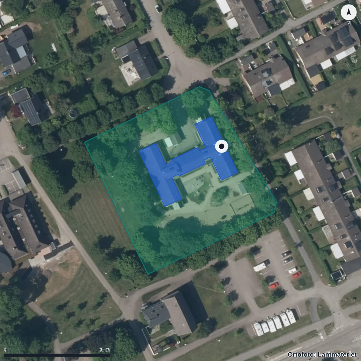 Flygbild över Backgårdsgatan 33, ortofoto från Lantmäteriet