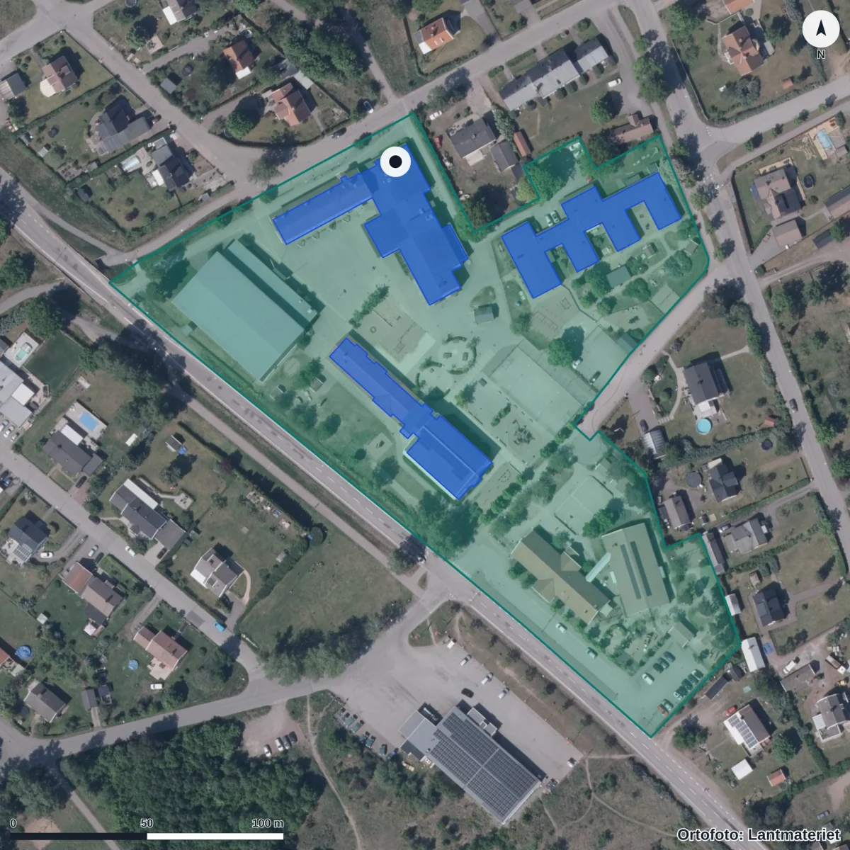 Flygbild över Förskolan Trekanten, ortofoto från Lantmäteriet