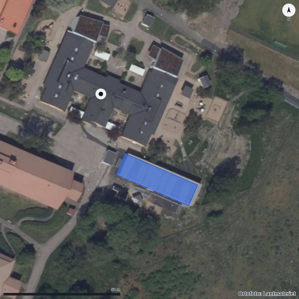 Flygbild över Kastellegården Förskola, ortofoto från Lantmäteriet