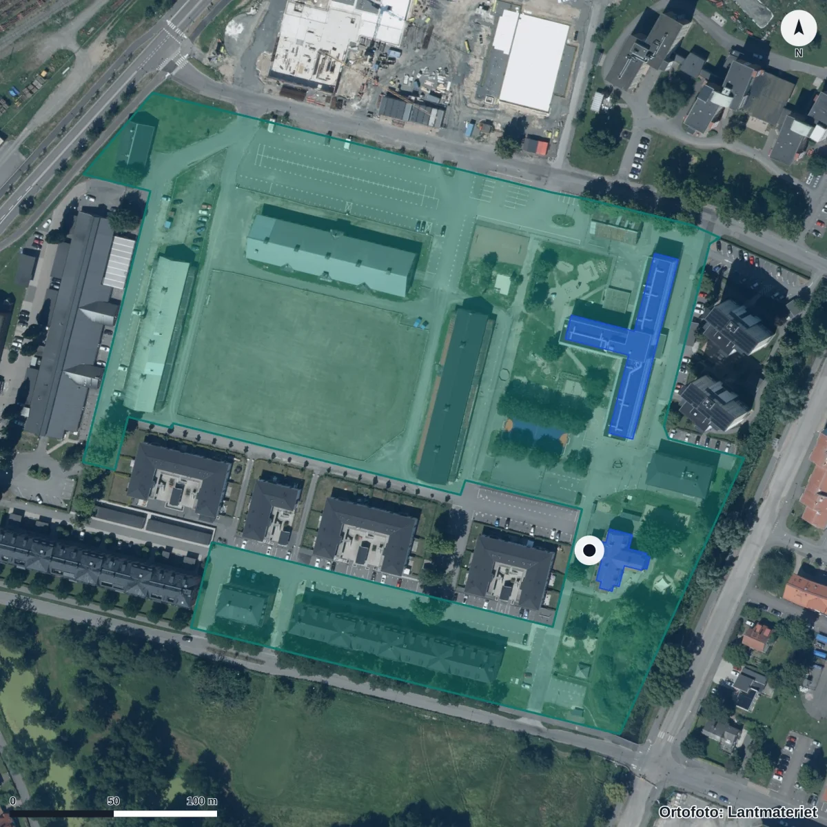 Flygbild över Pysslingen Lyckan Förskola, ortofoto från Lantmäteriet