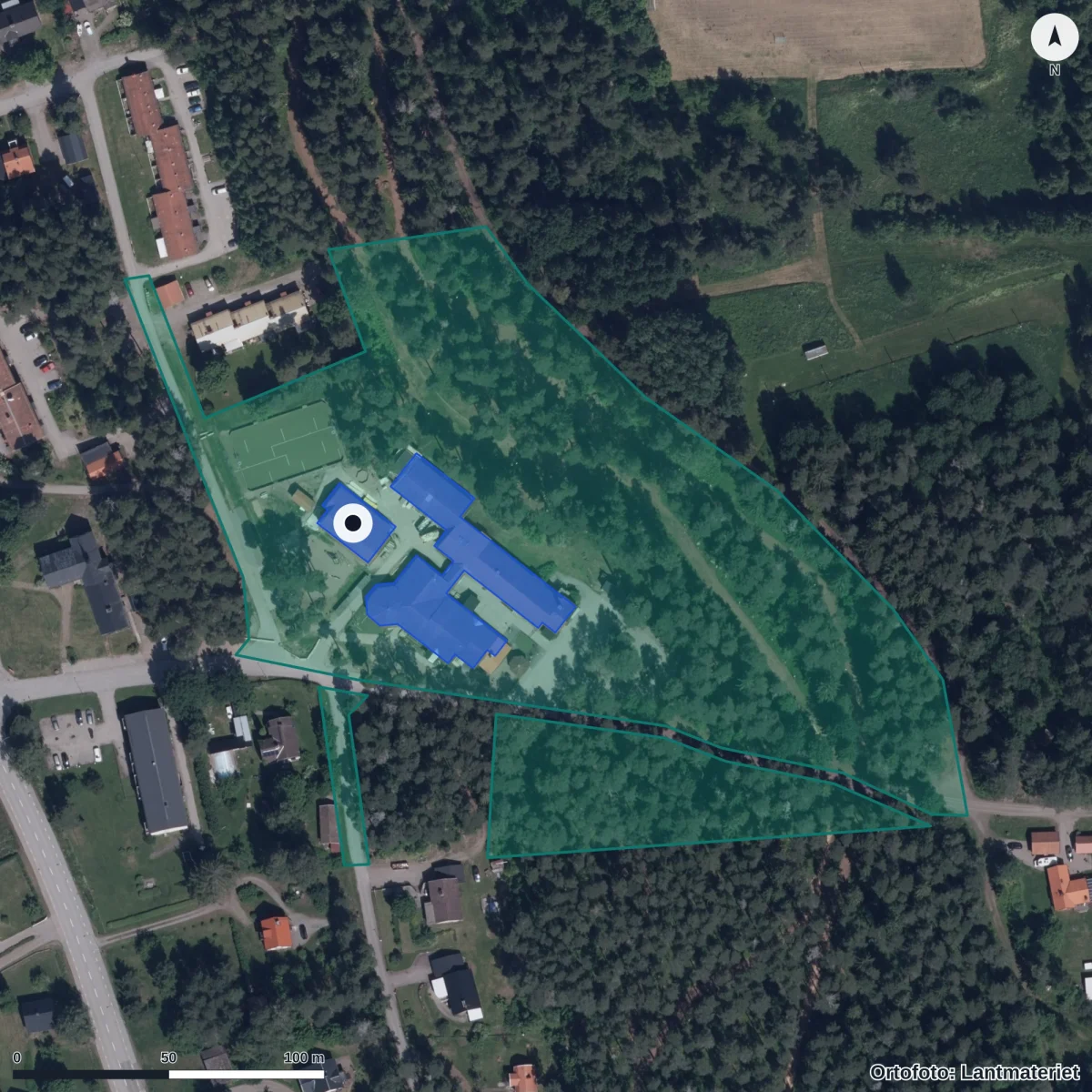 Flygbild över Förskolan Tallbacken, ortofoto från Lantmäteriet