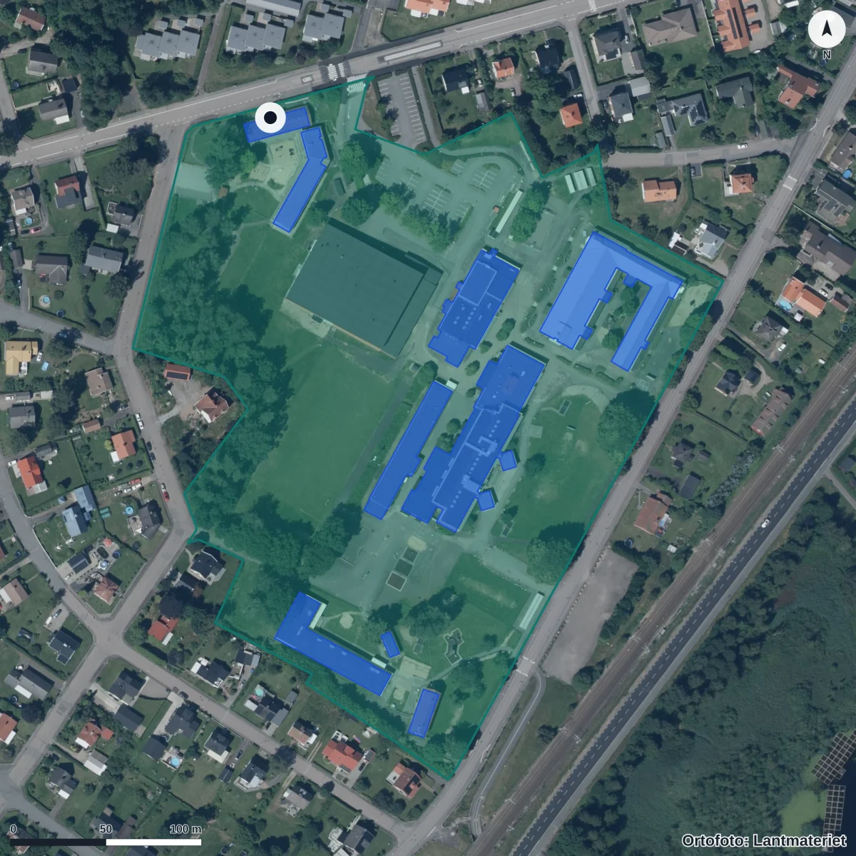 Flygbild över Hasselgårdens Förskola, ortofoto från Lantmäteriet