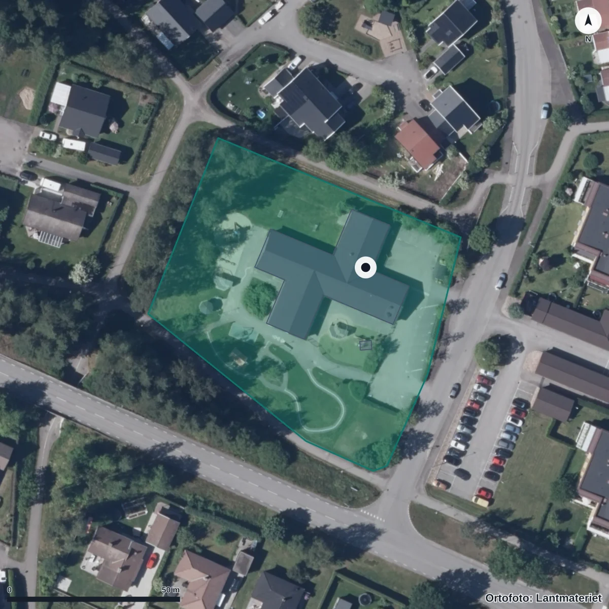 Flygbild över Förskolan Slottet, ortofoto från Lantmäteriet