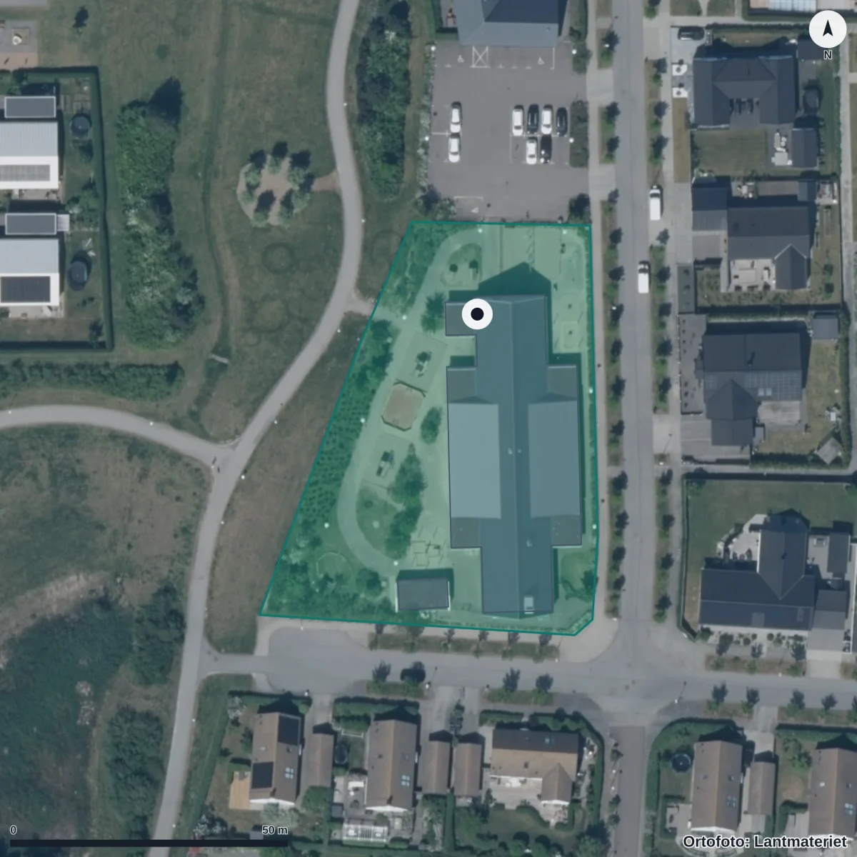Flygbild över Fjärilens Förskola, ortofoto från Lantmäteriet
