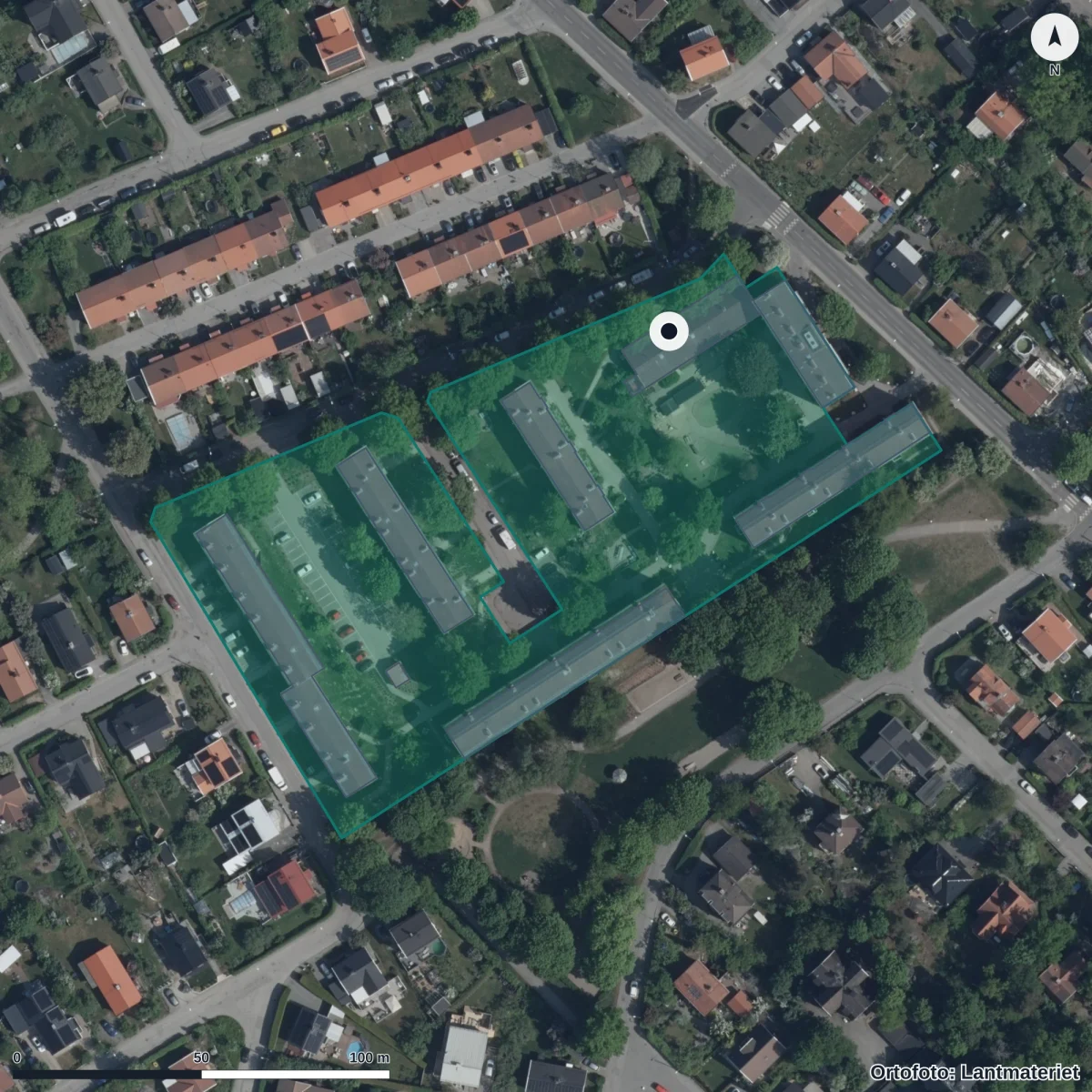 Flygbild över Förskolan Örtagården, Pysslingen, ortofoto från Lantmäteriet