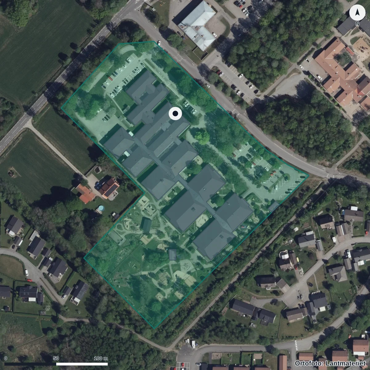 Flygbild över Alprosgårdens Förskola, ortofoto från Lantmäteriet