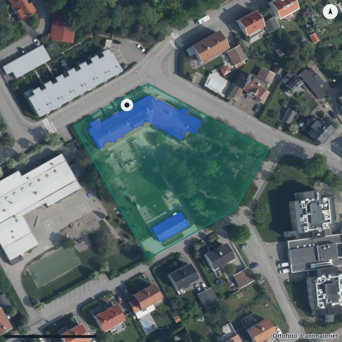 Flygbild över Vallbacksgården, ortofoto från Lantmäteriet