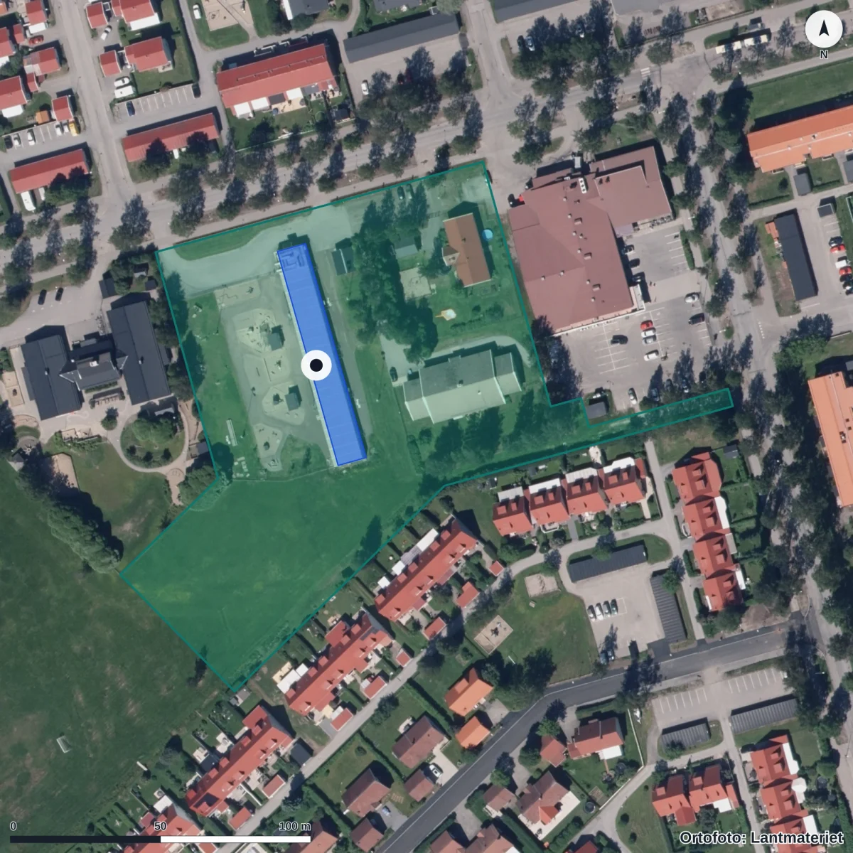 Flygbild över Förskolan Plommonet, ortofoto från Lantmäteriet