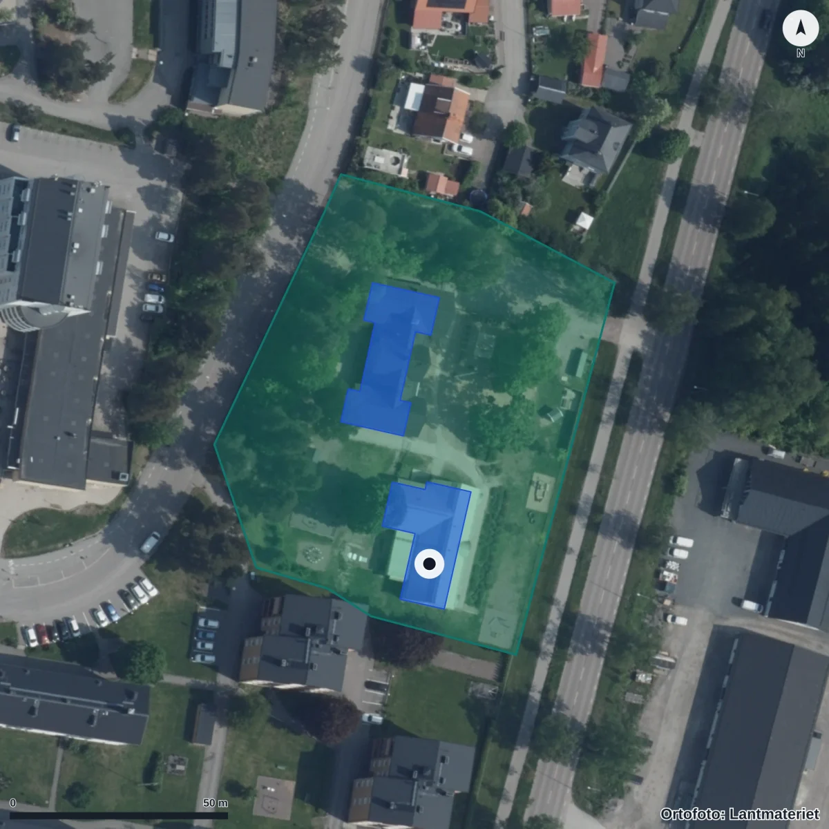 Flygbild över Källbacken, ortofoto från Lantmäteriet