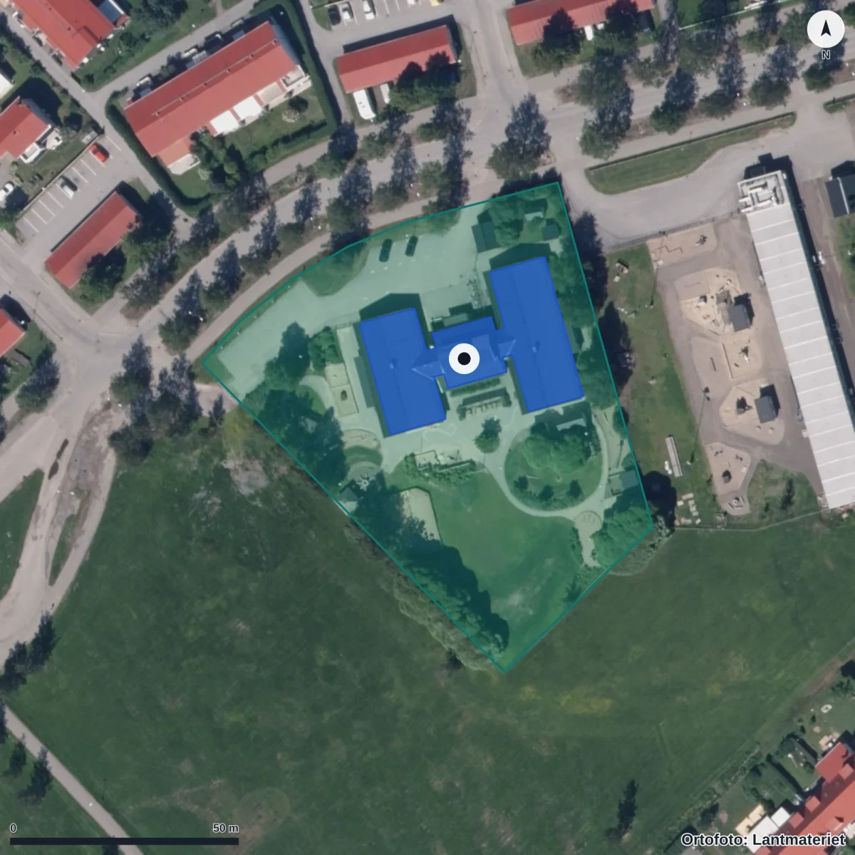 Flygbild över Förskolan Fröhuset, ortofoto från Lantmäteriet