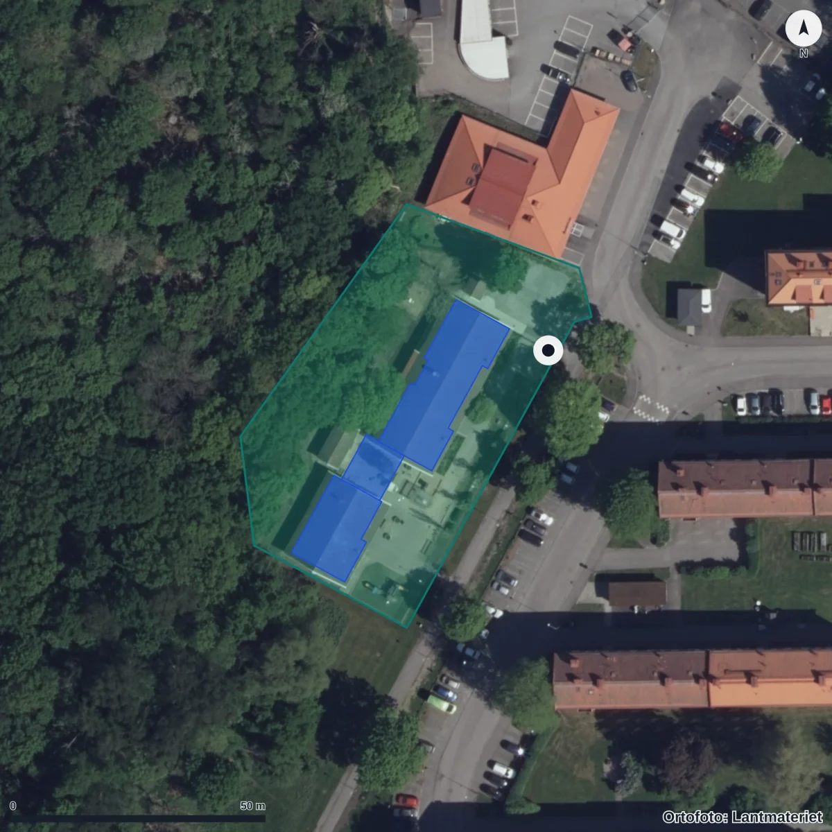 Flygbild över Omvägen 2 F Förskola, ortofoto från Lantmäteriet