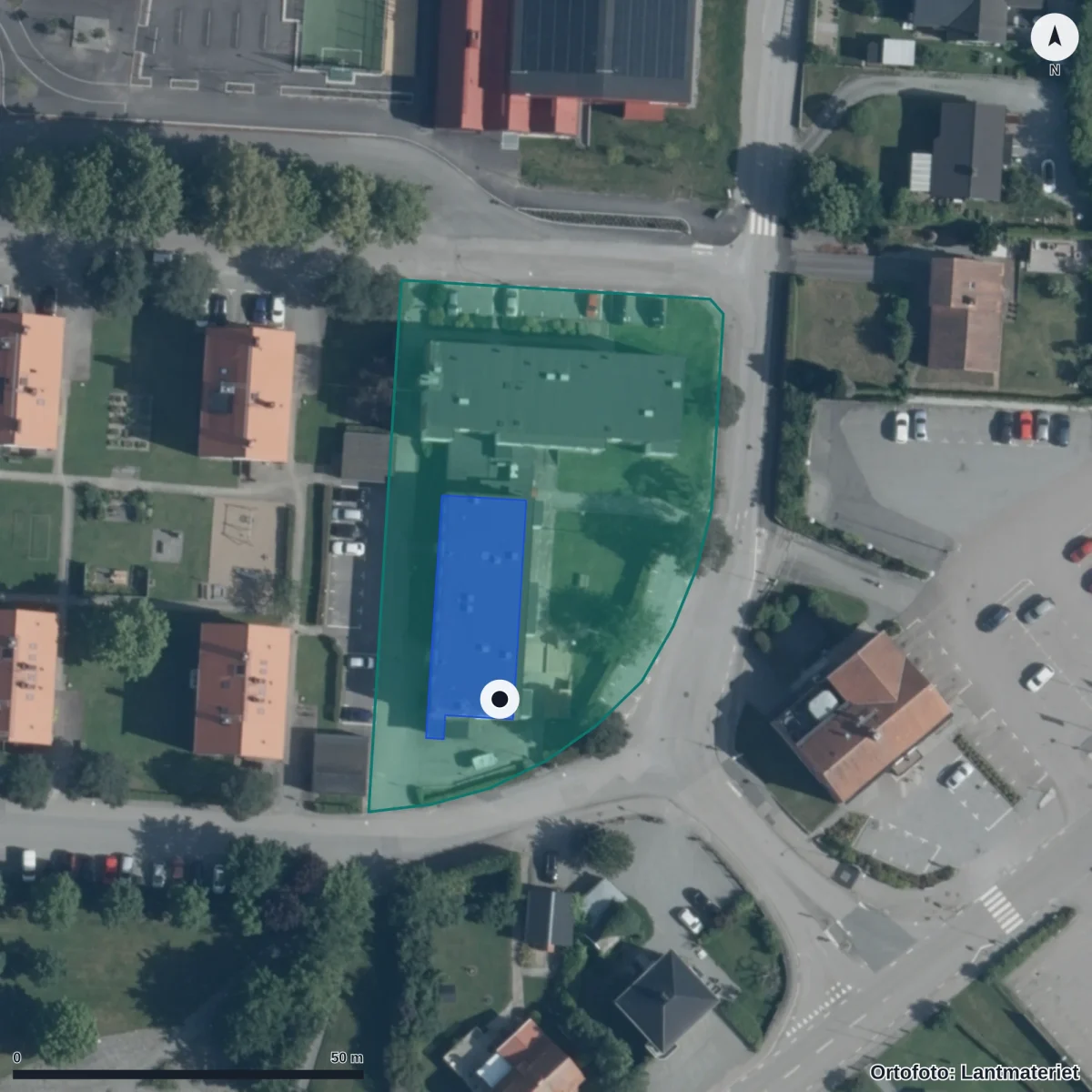 Flygbild över Treklangens Förskola, ortofoto från Lantmäteriet