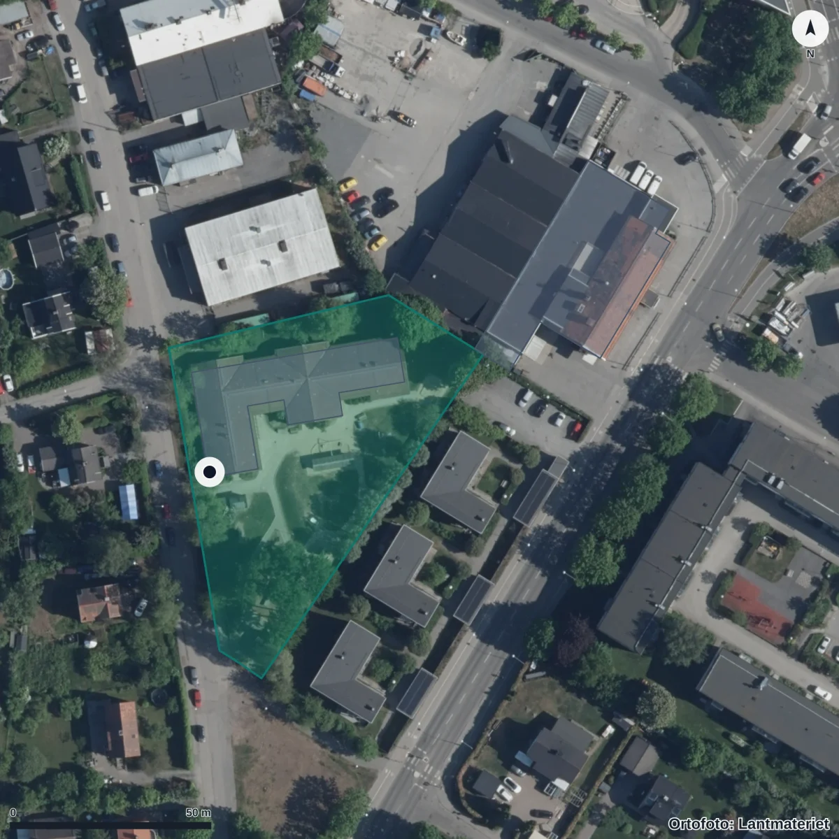 Flygbild över Förskolan Skydraget, ortofoto från Lantmäteriet