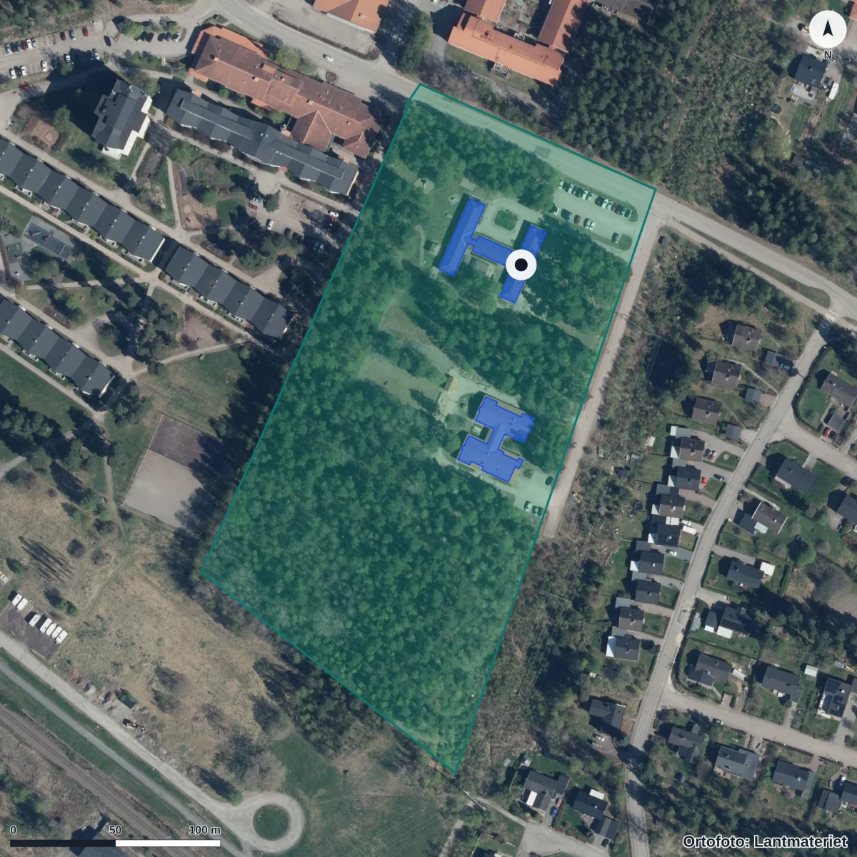 Flygbild över Förskolan Tallkotten, ortofoto från Lantmäteriet