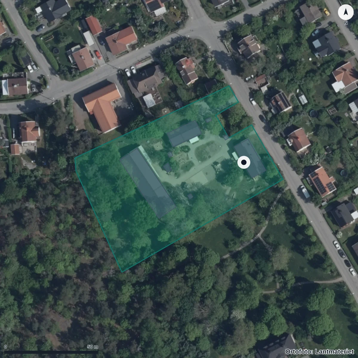 Flygbild över Förskolan Sagoträdet, Pysslingen, ortofoto från Lantmäteriet