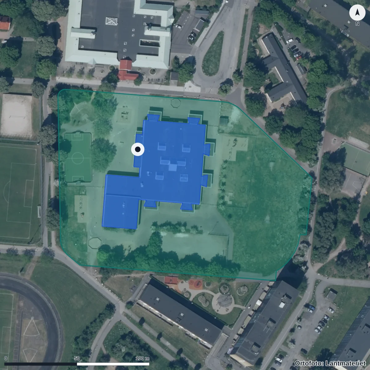 Flygbild över Stockrosens Förskola, ortofoto från Lantmäteriet