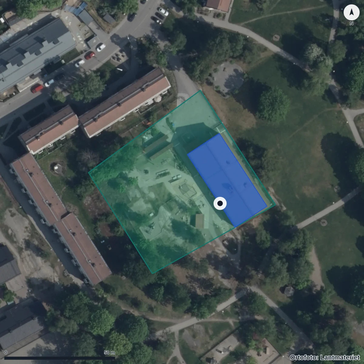 Flygbild över Förskolan Regnbågen, ortofoto från Lantmäteriet