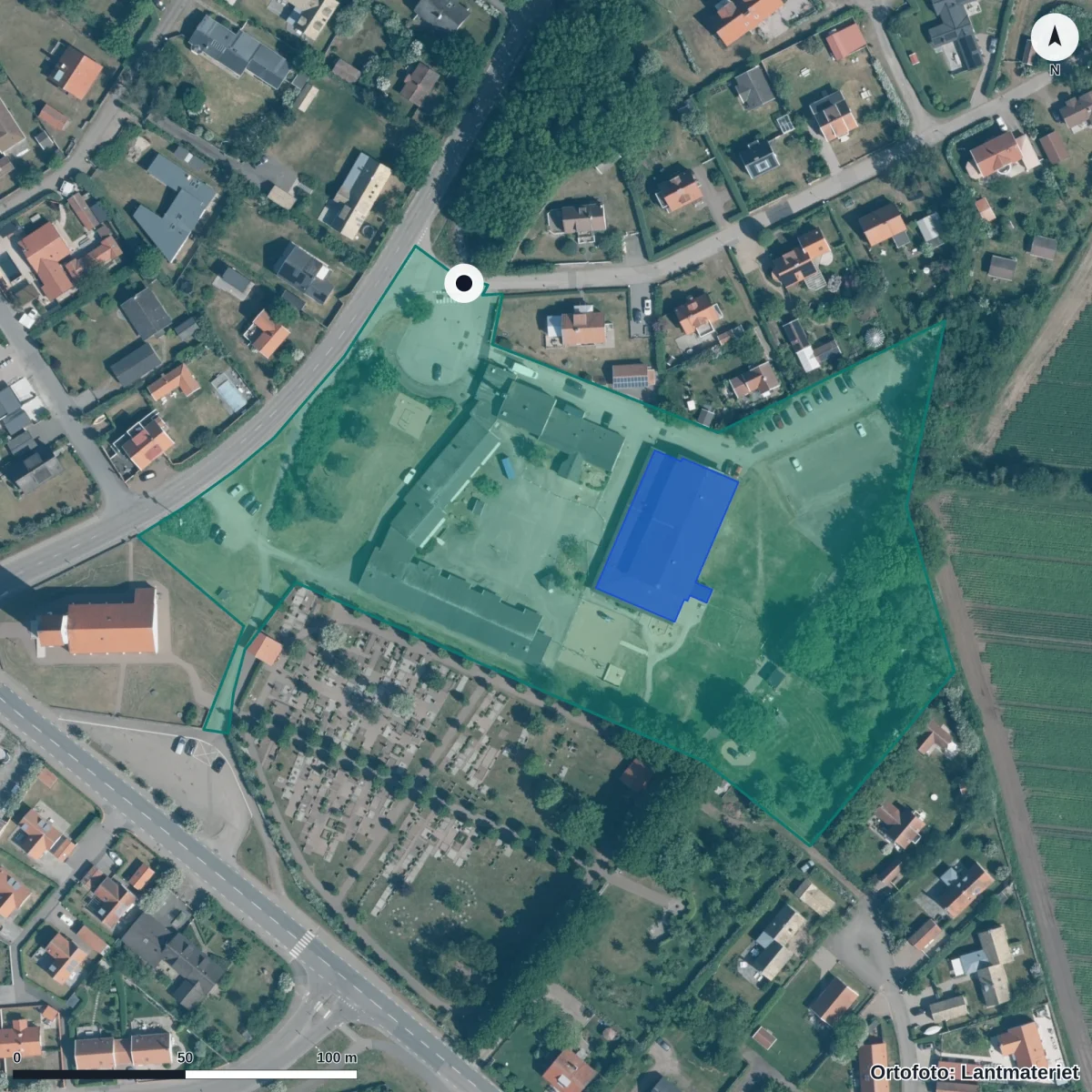 Flygbild över Klockarebyns Förskola, ortofoto från Lantmäteriet