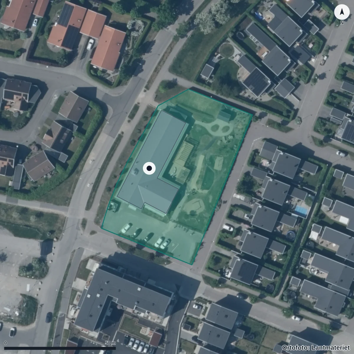 Flygbild över Norlandia Förskolor Trädgårdslunden, ortofoto från Lantmäteriet