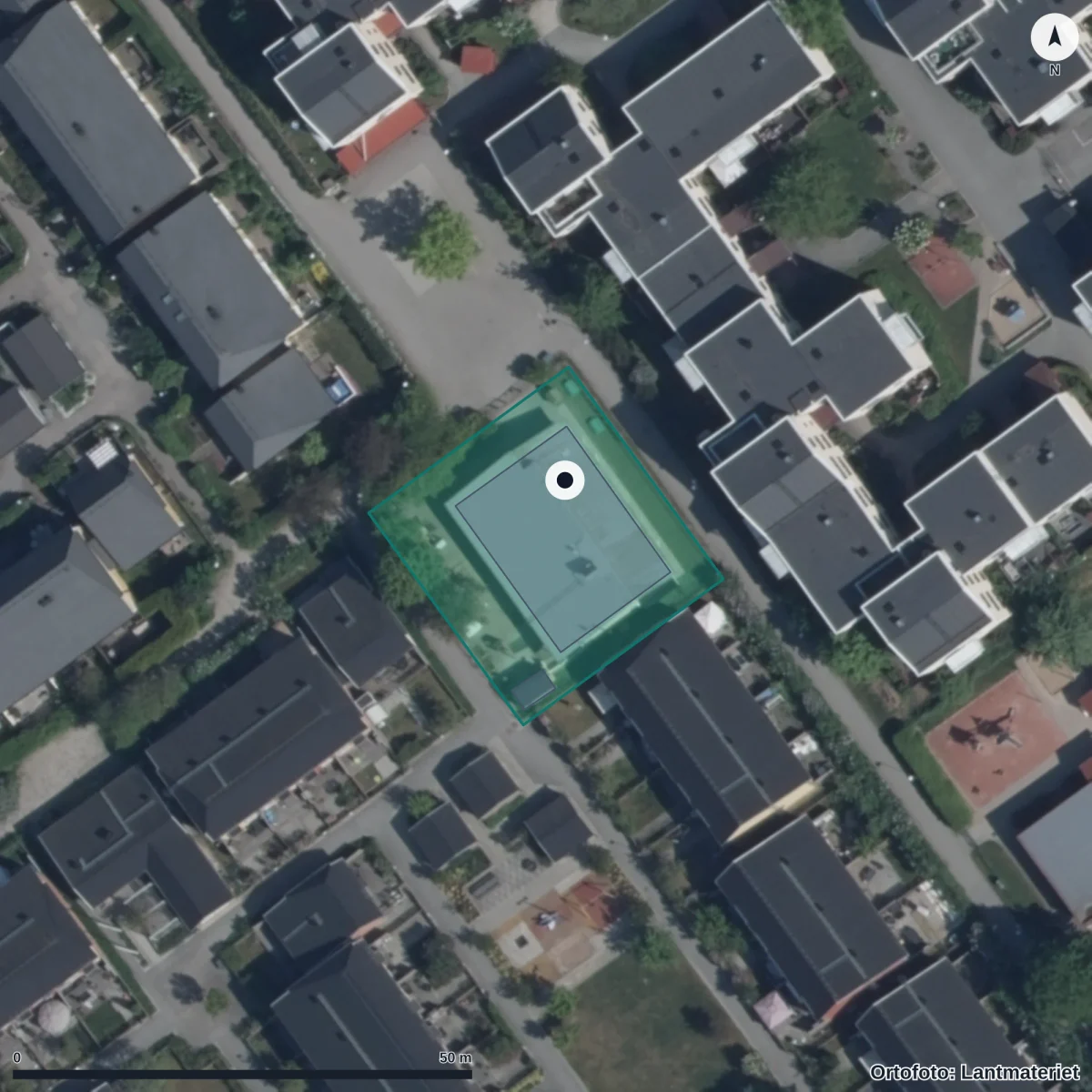 Flygbild över Förskolan Fenix, Pysslingen, ortofoto från Lantmäteriet