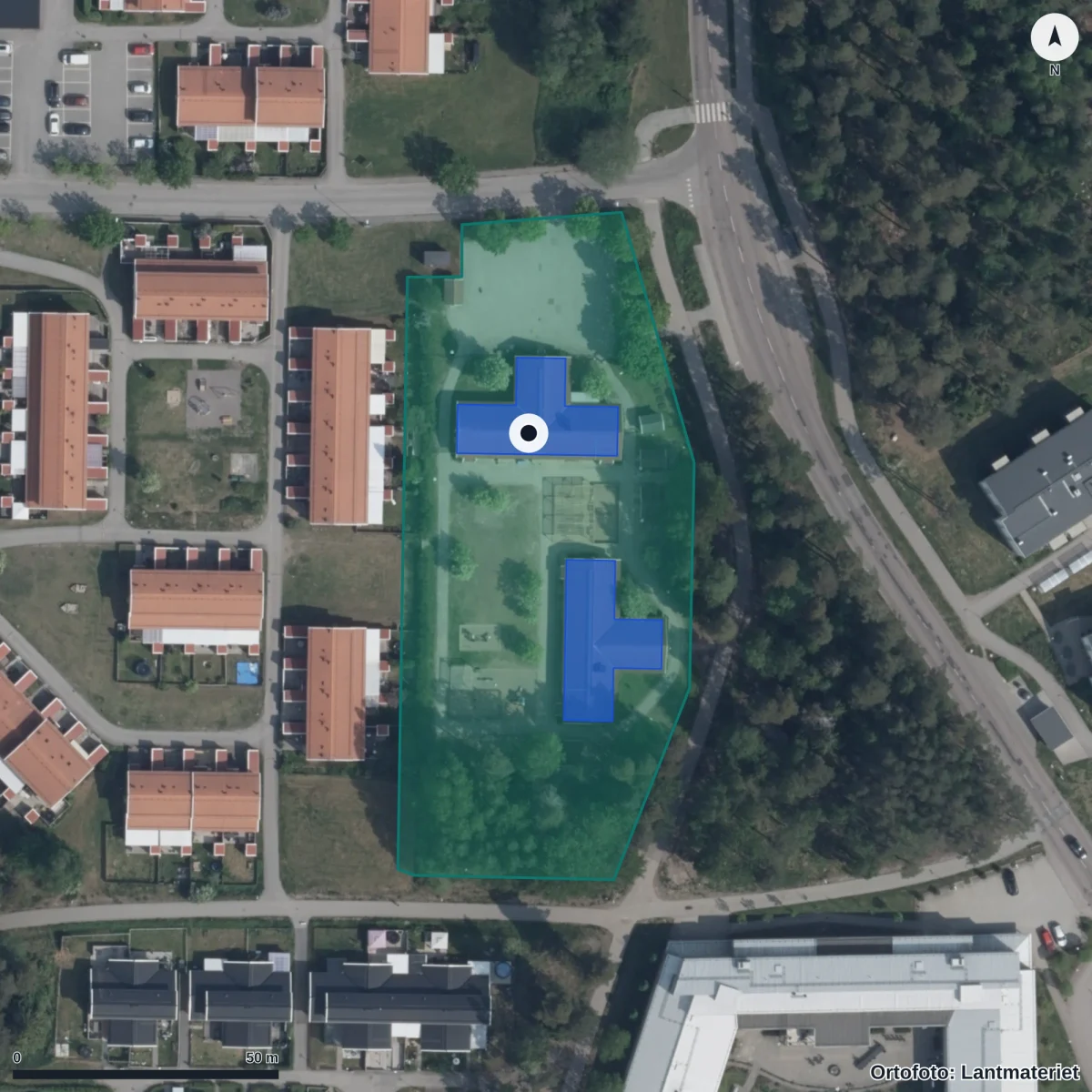 Flygbild över Pukslagargården, ortofoto från Lantmäteriet