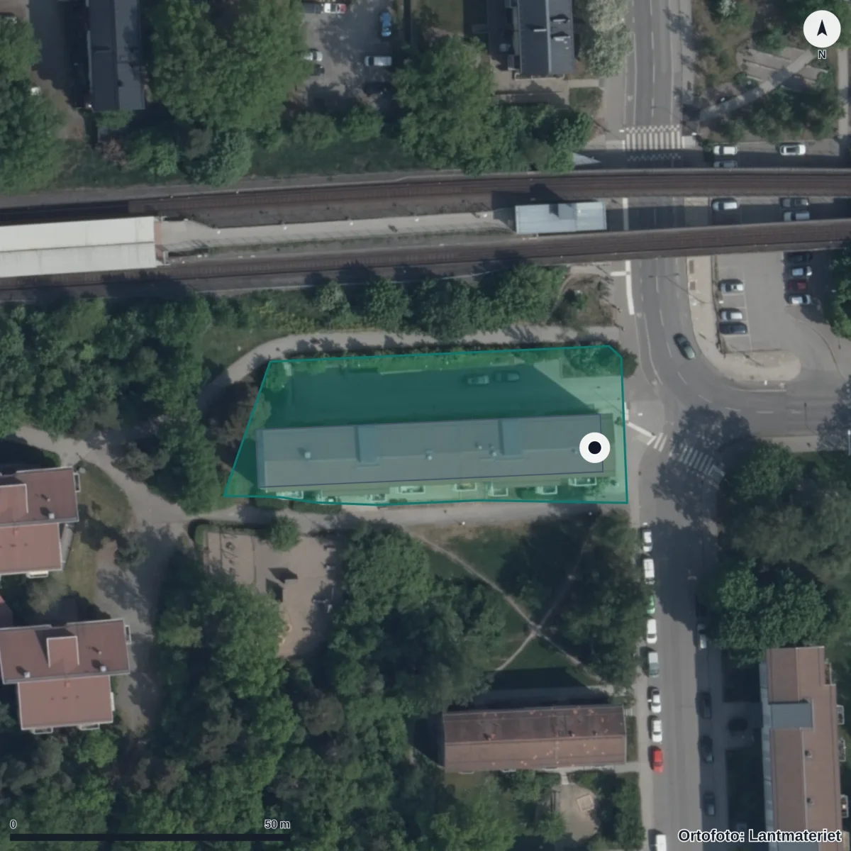 Flygbild över Förskolan Cosmos, ortofoto från Lantmäteriet