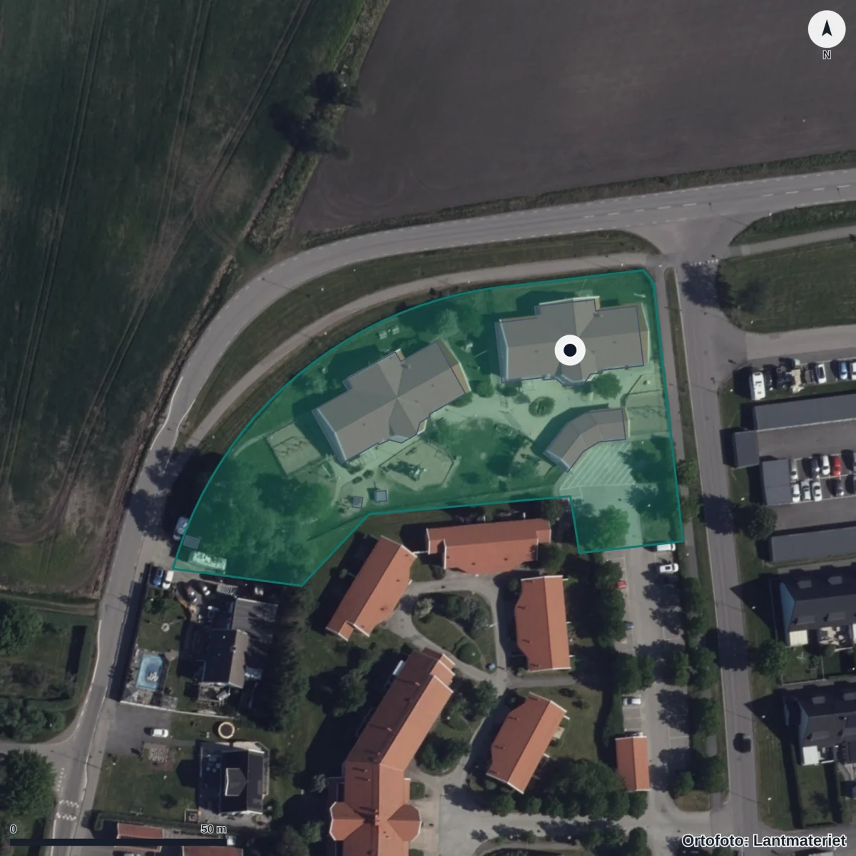 Flygbild över Pölagårdens Förskola, ortofoto från Lantmäteriet