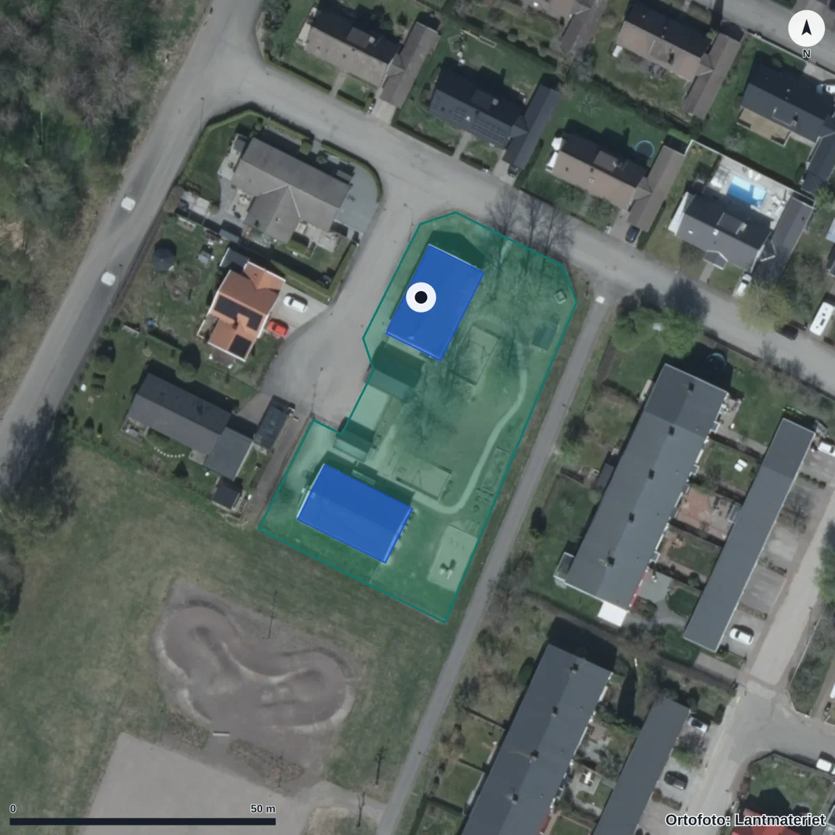Flygbild över Romstads Förskola, ortofoto från Lantmäteriet